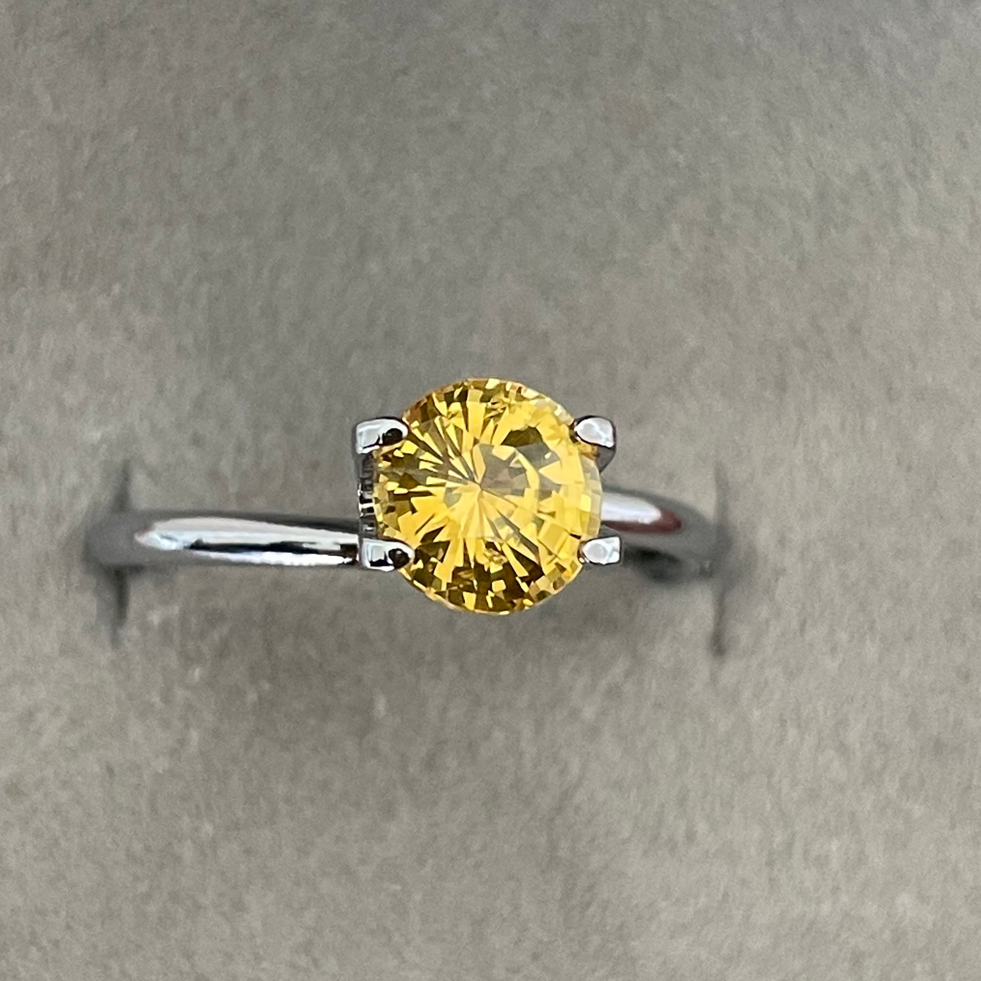 yellow round sapphire 1.58