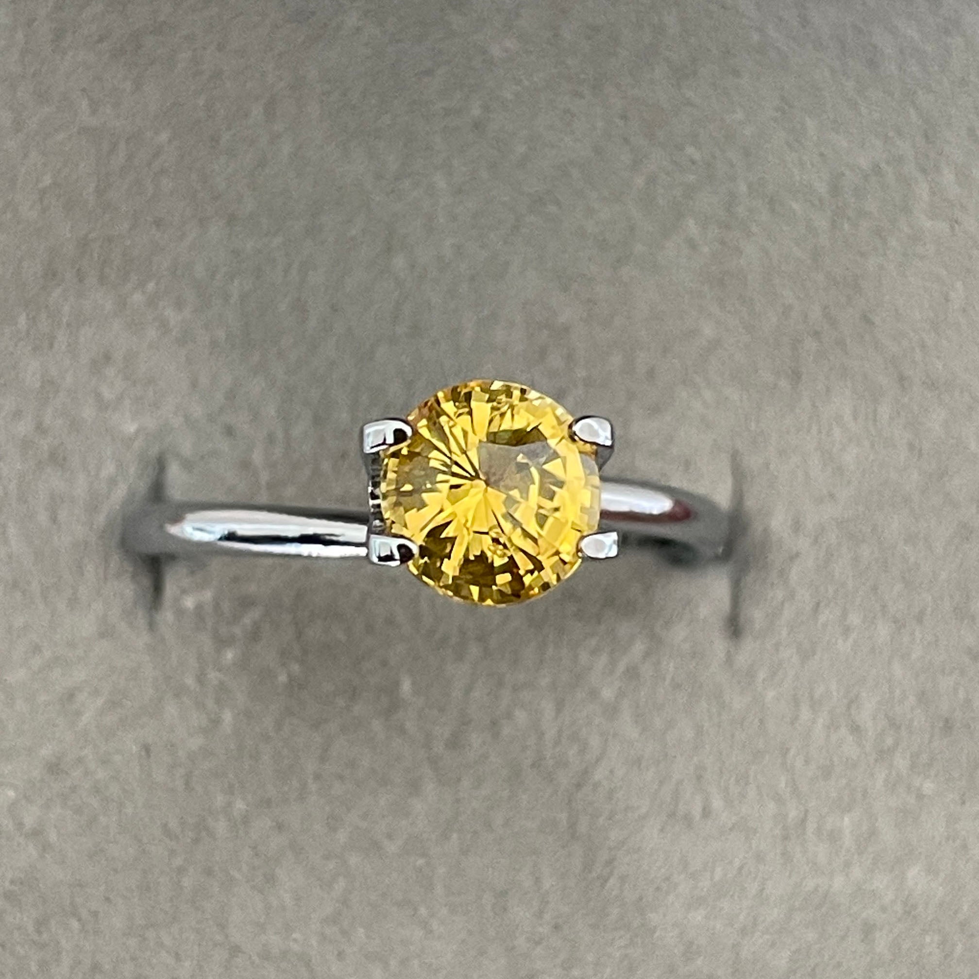 yellow round sapphire 1.58