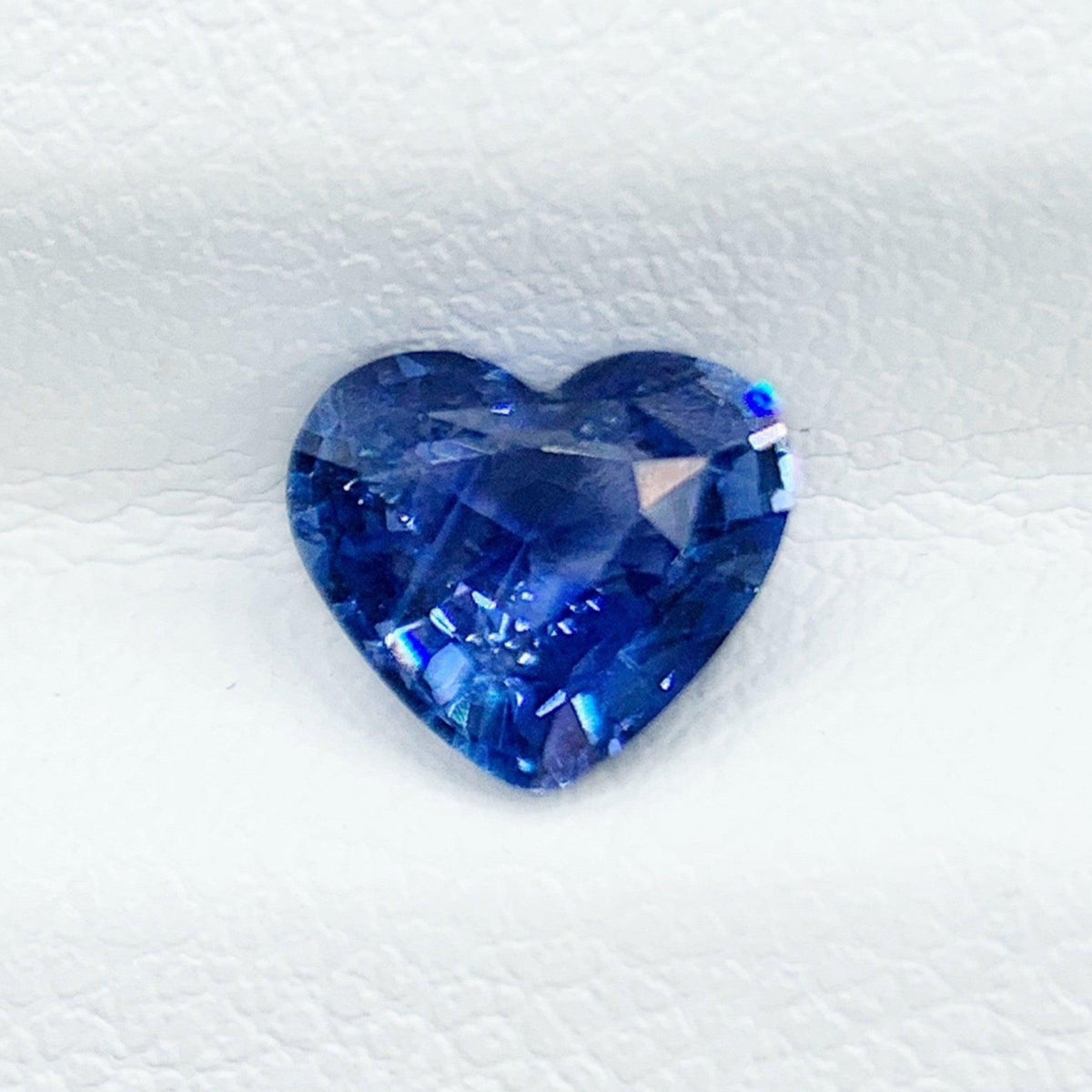 Natural Sri Lanka blue sapphire, 1.06ct heart cut Neelam stone from NASHGEMS, showcasing vibrant blue color and gemstone clarity.