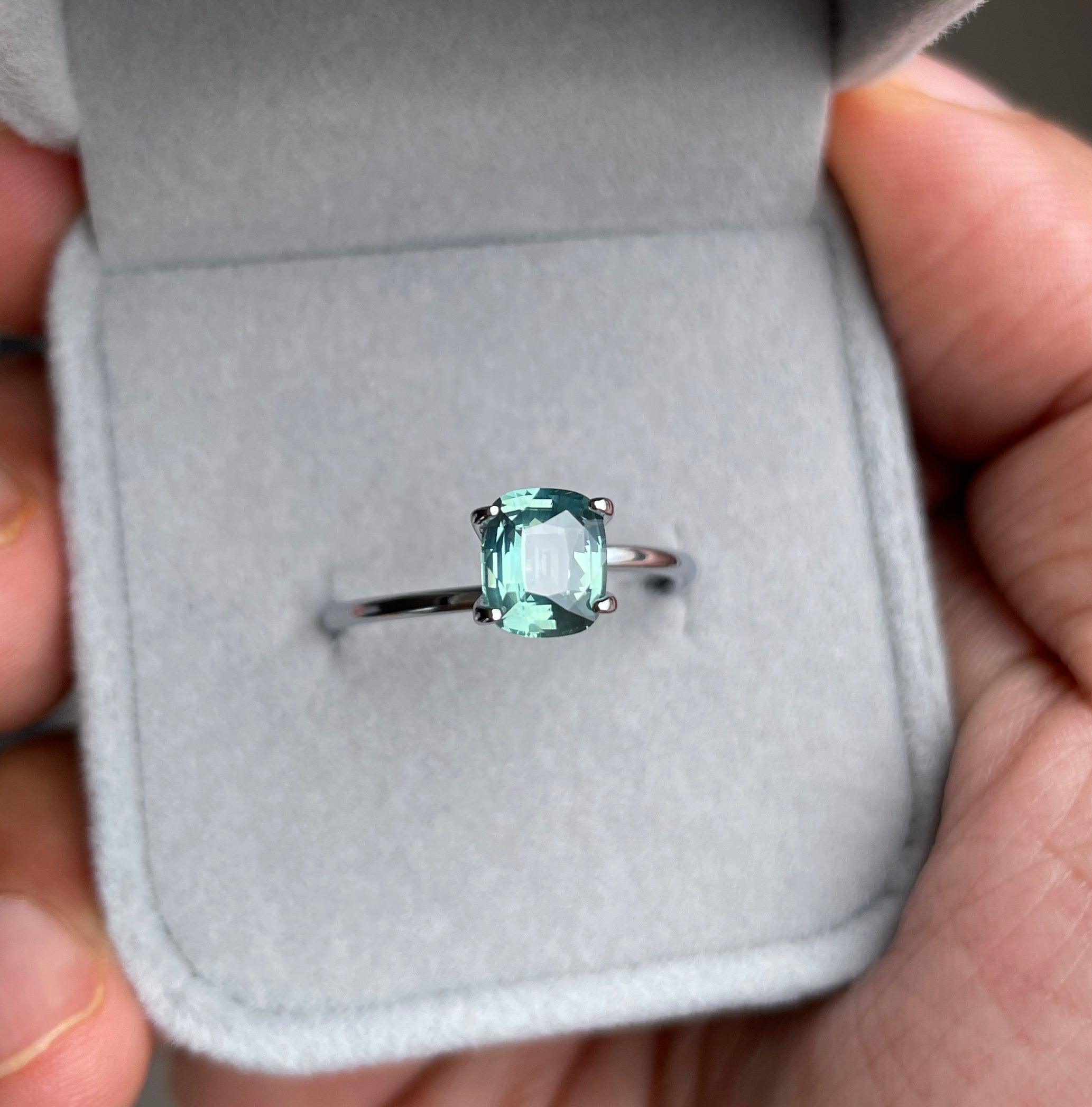 teal blue green parti sapphire cushion cut gem
