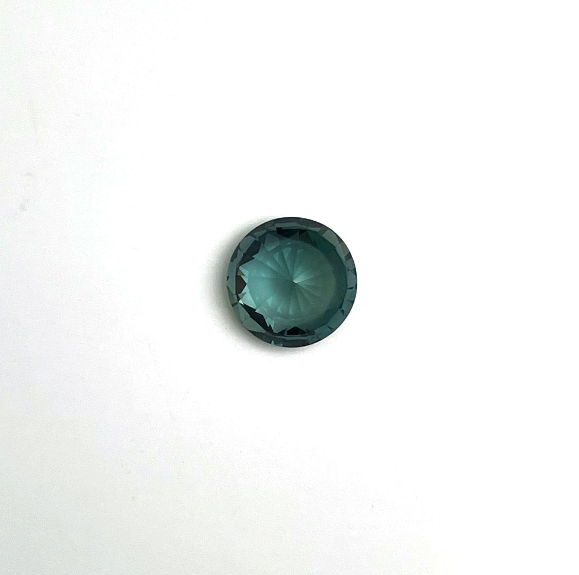 teal blue green parti sapphire round cut gem