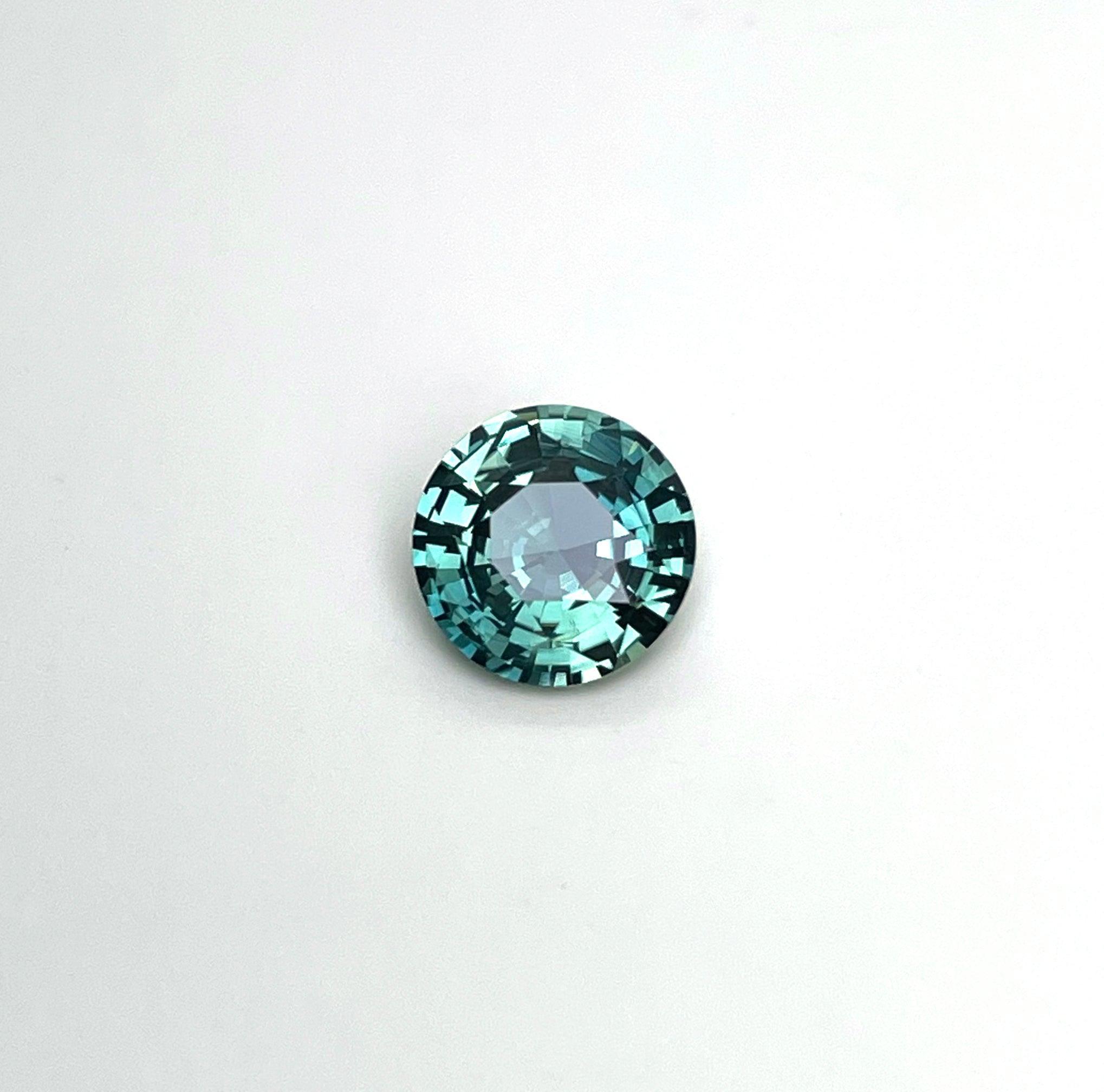 teal blue green parti sapphire round cut gem