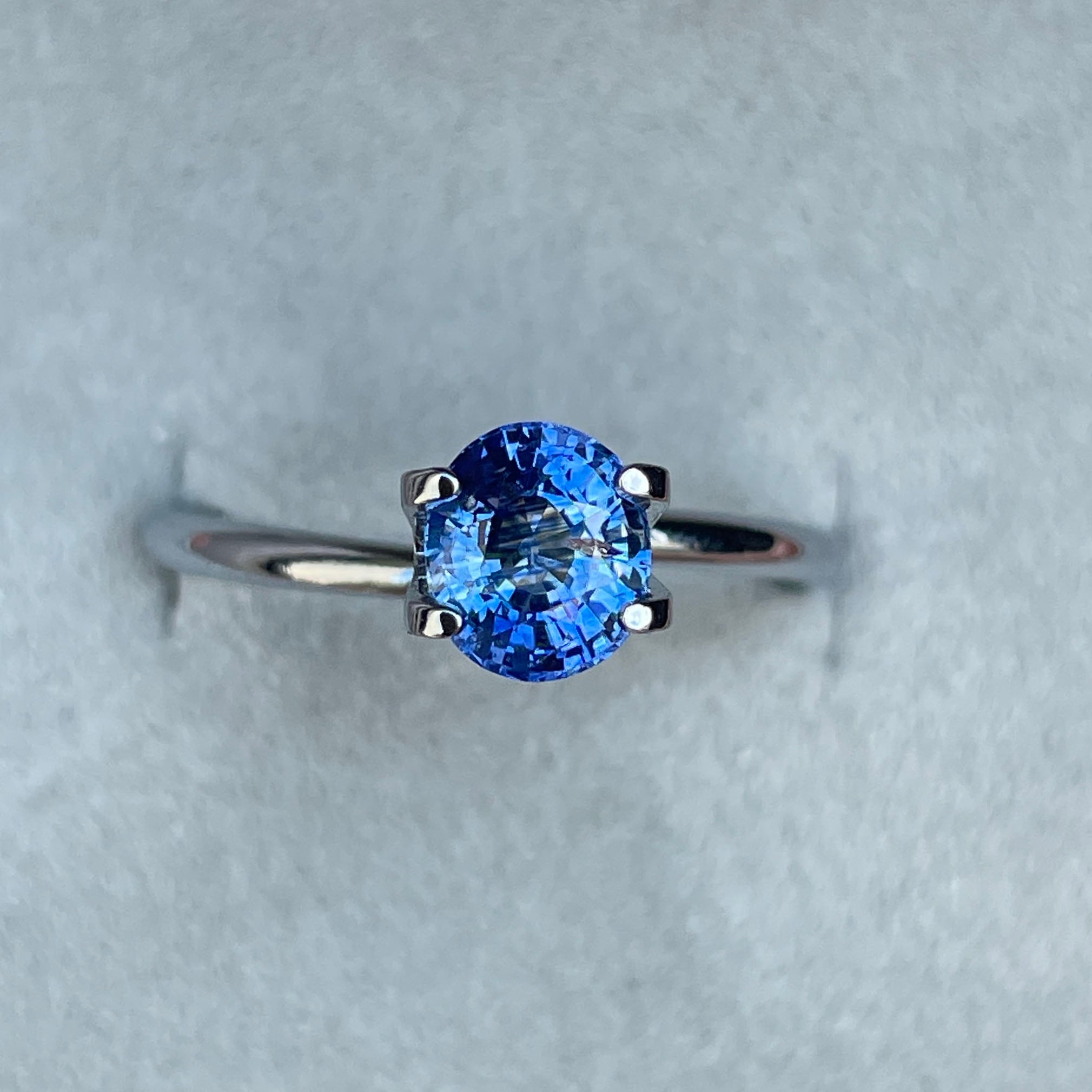 Eye clean blue sapphire under natural light