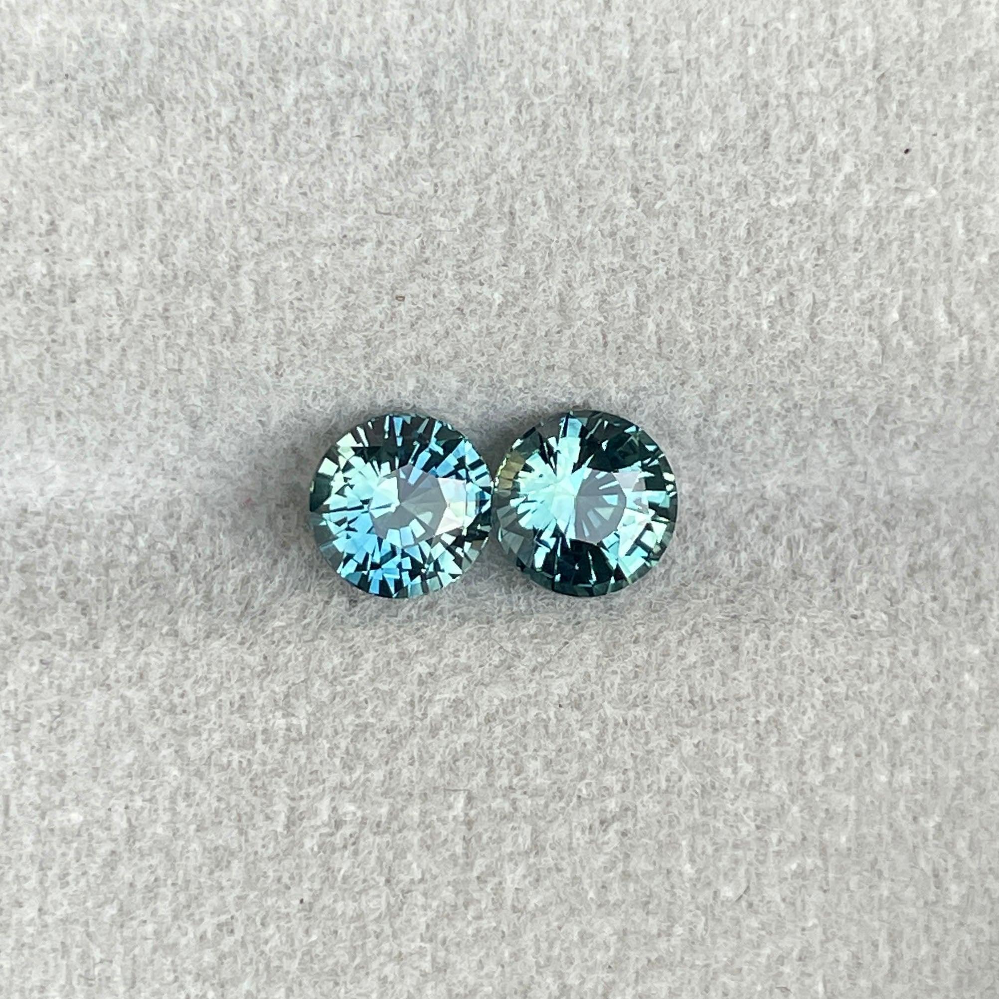 Blue green teal sapphire round pair