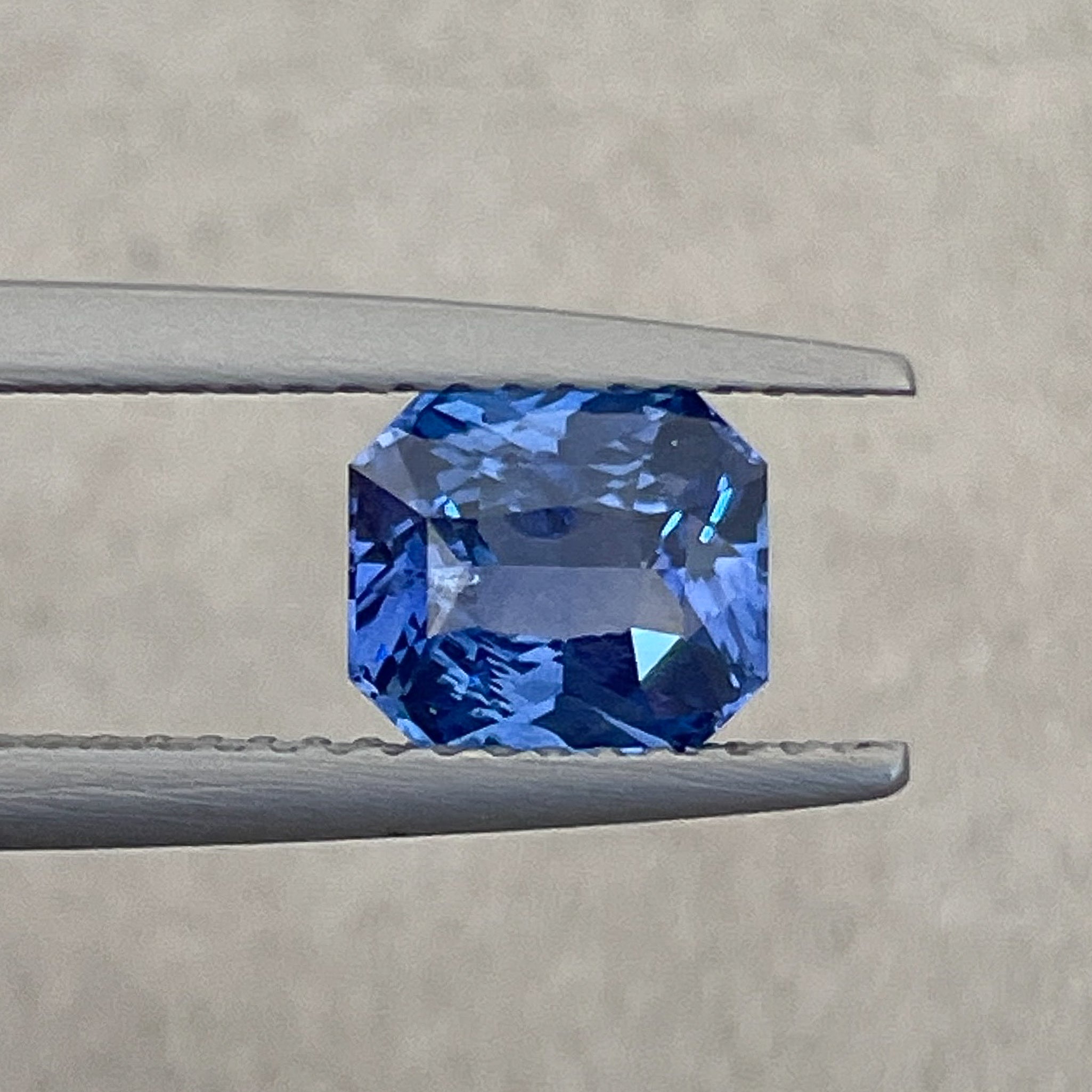 Natural Ceylon Blue Sapphire 1.52 Ct radiant cut by NASHGEMS, vivid blue loose sapphire for engagement or custom jewelry.