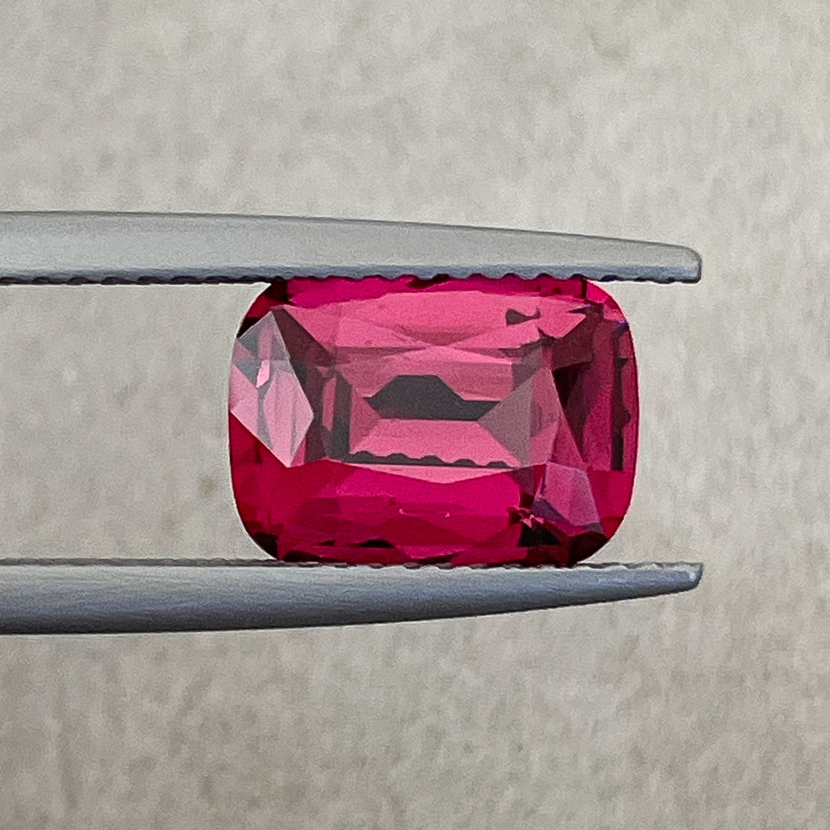 Natural Rhodolite Garnet 3.52 Ct cushion cut loose gemstone in raspberry red, VVS clarity, ideal for engagement rings.