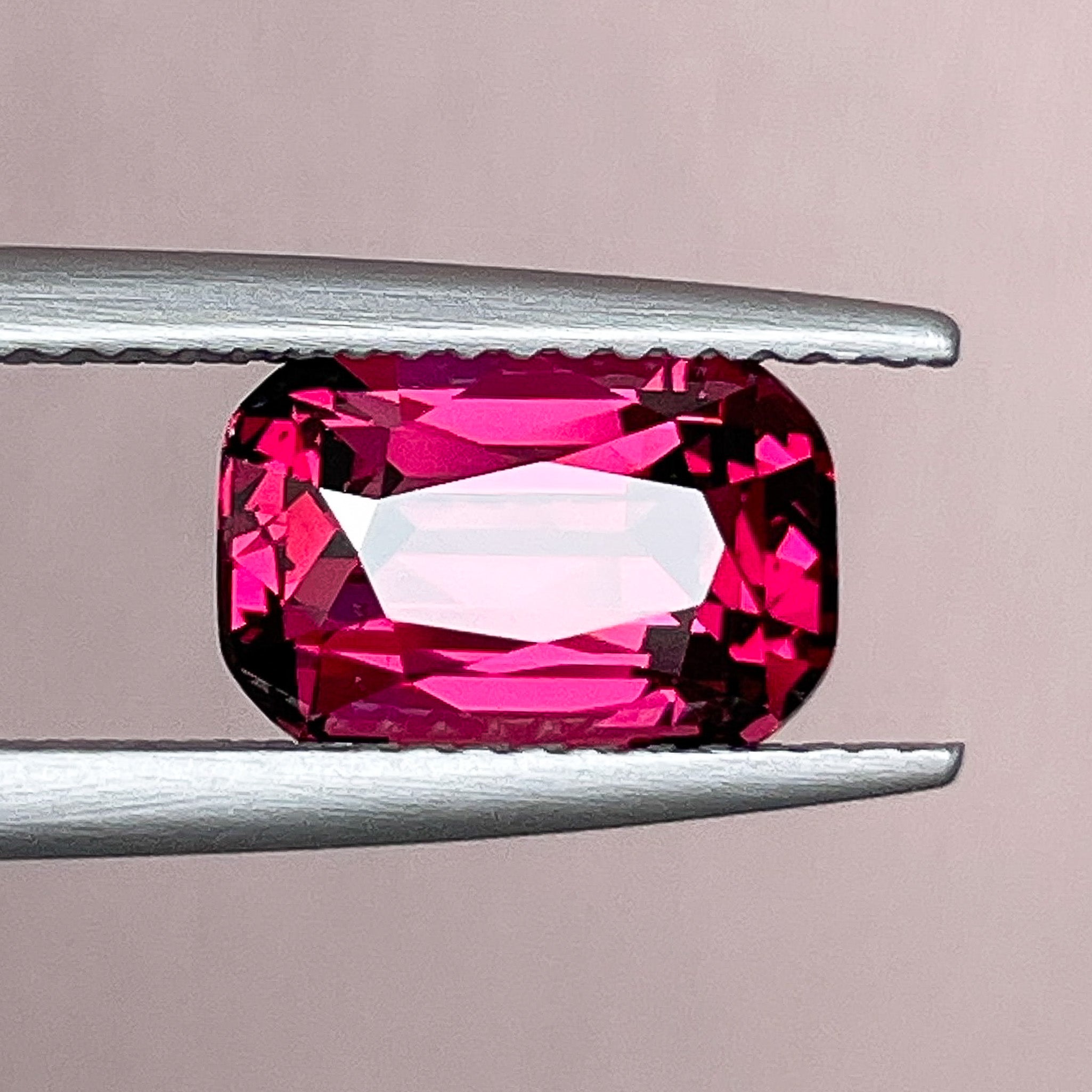 Natural Rhodolite Garnet 3.18 Ct cushion cut loose gemstone in raspberry red, VVS clarity, ideal for engagement rings.