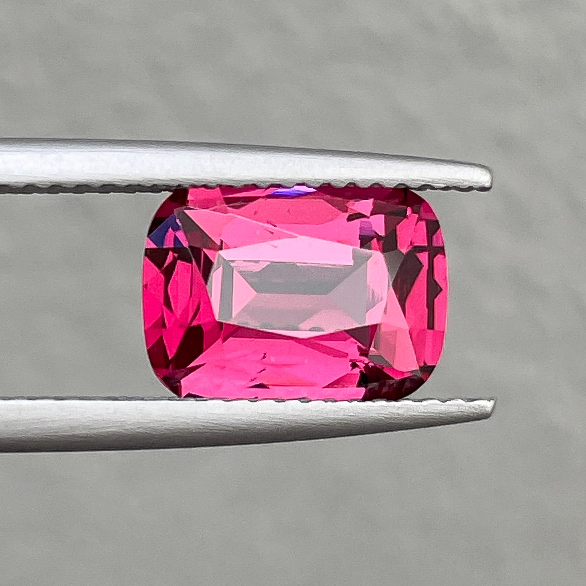 Natural Rhodolite Garnet 3.52 Ct cushion cut gemstone with vibrant raspberry red color, from NASHGEMS for engagement rings.