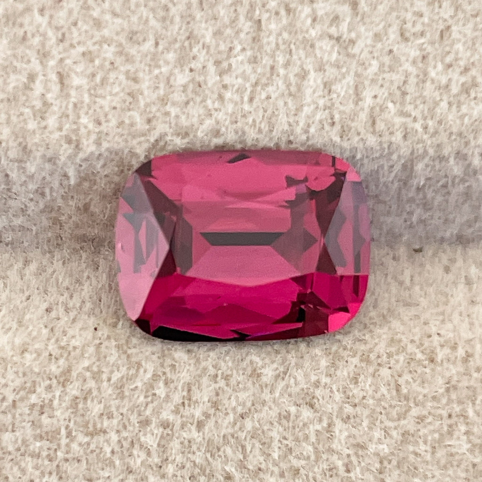 Natural Rhodolite Garnet 3.52 ct cushion cut loose gemstone with raspberry red color, VVS clarity from NASHGEMS.