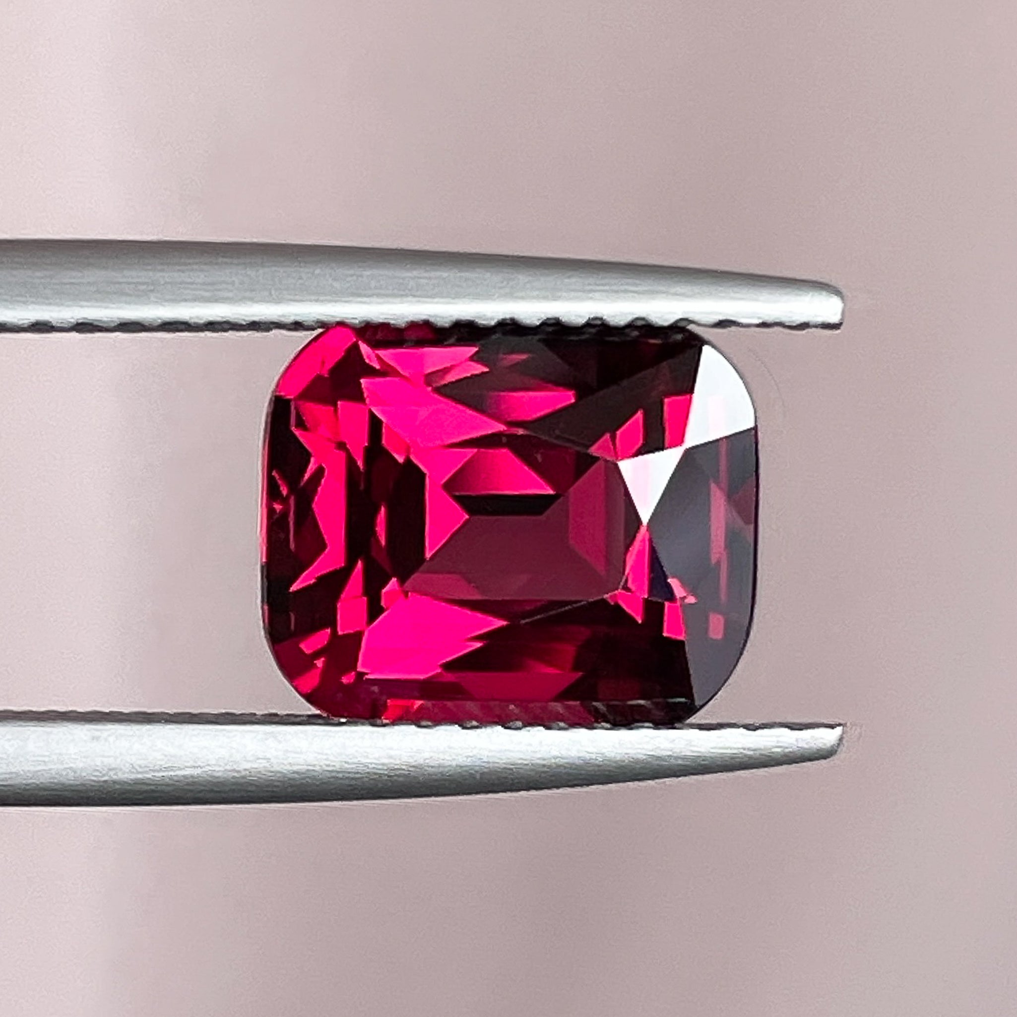 Natural Rhodolite Garnet 3.96 Ct cushion cut loose gemstone in deep red, VVS clarity, suitable for engagement rings.