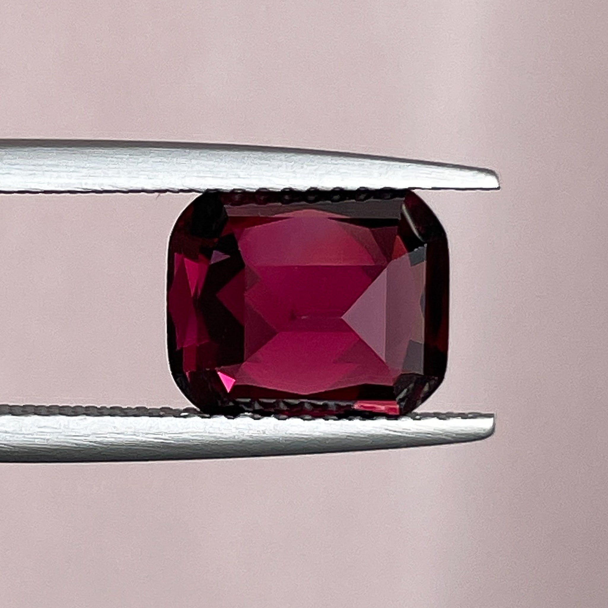 Natural Rhodolite Garnet 3.96 Ct cushion cut loose gemstone in deep red, VVS clarity, ideal for engagement rings.