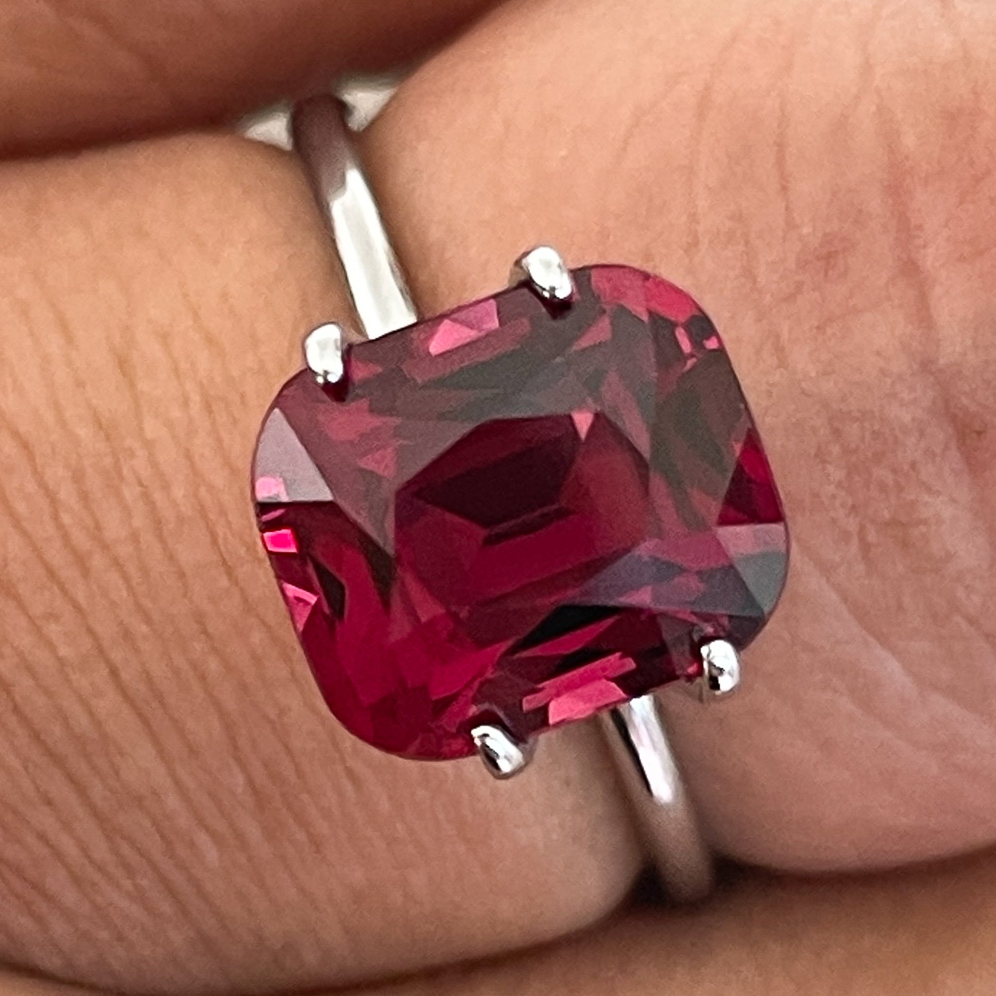 Natural Rhodolite Garnet 3.96 Ct cushion cut loose gemstone showing deep red color and VVS clarity for jewelry use