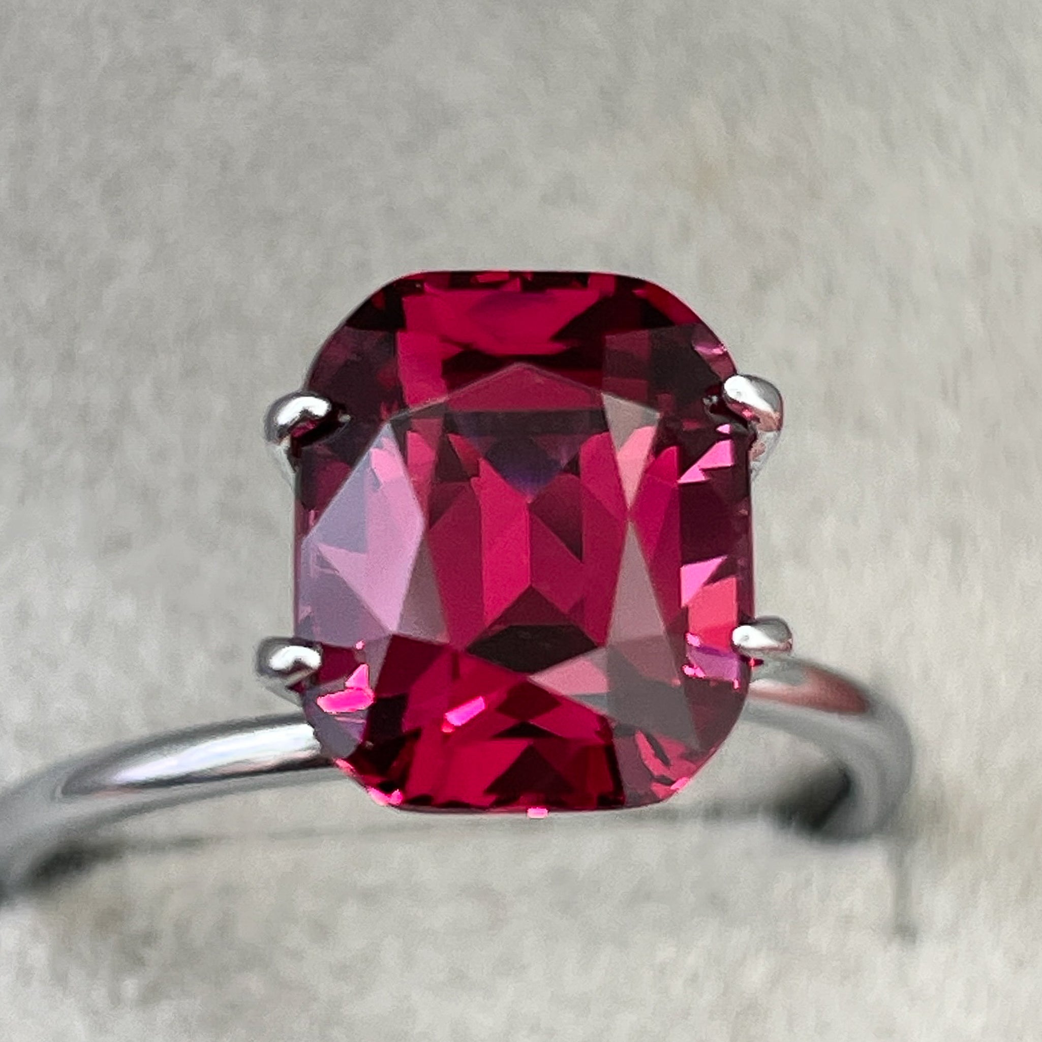 Natural Rhodolite Garnet 4.53 Ct cushion cut loose gemstone, raspberry red VVS clarity, ideal for engagement jewelry.