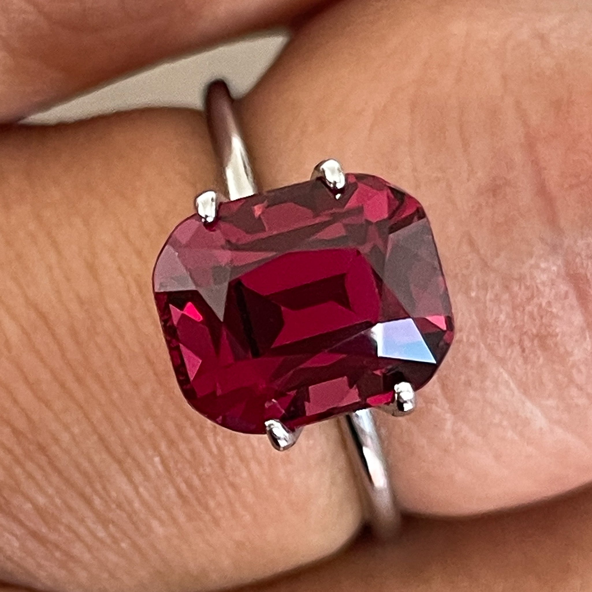 Natural Rhodolite Garnet 4.53 Ct cushion cut gemstone in vibrant raspberry red for engagement rings, by NASHGEMS.