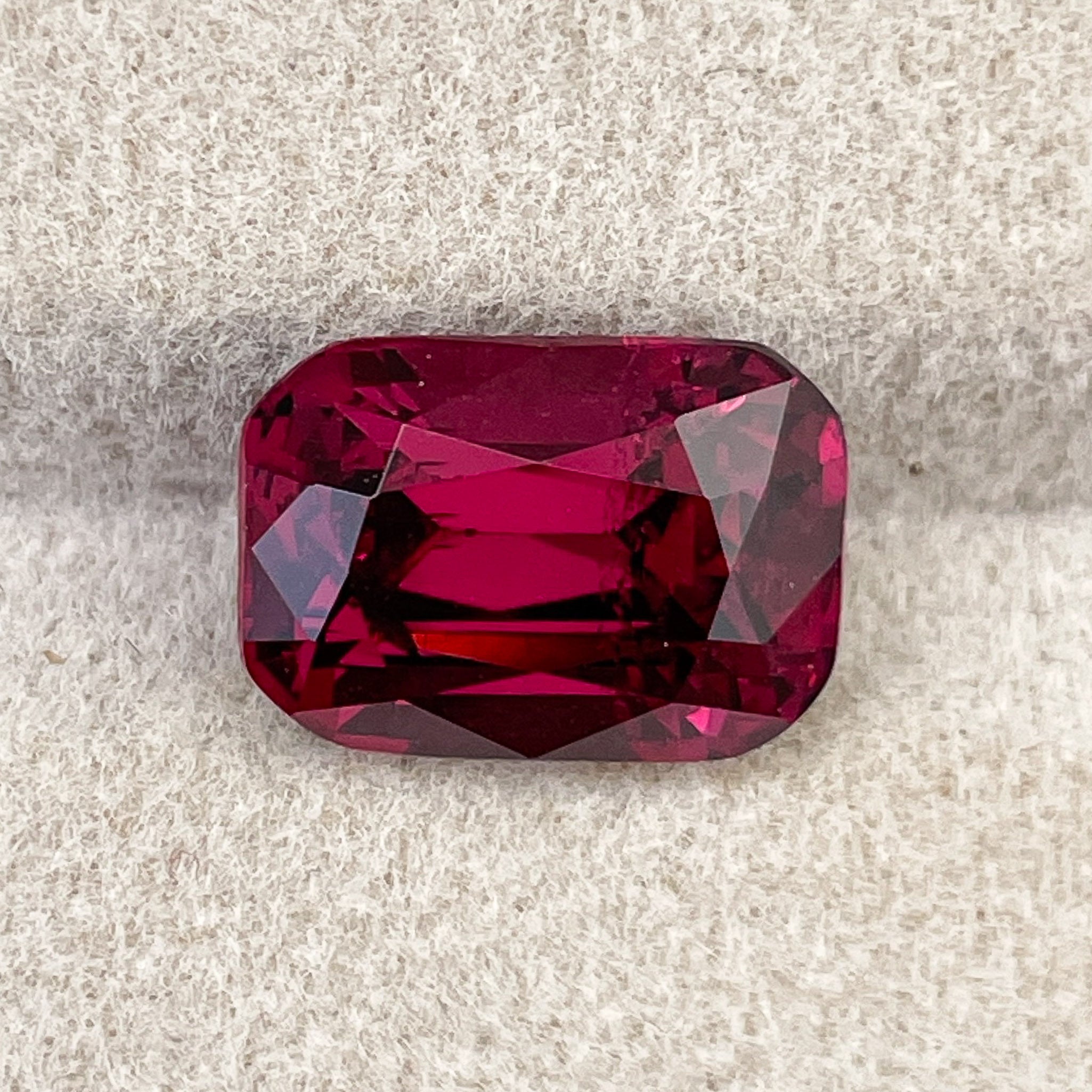 Natural Rhodolite Garnet 5 Ct cushion cut loose gemstone in raspberry red, perfect for engagement rings by NASHGEMS.