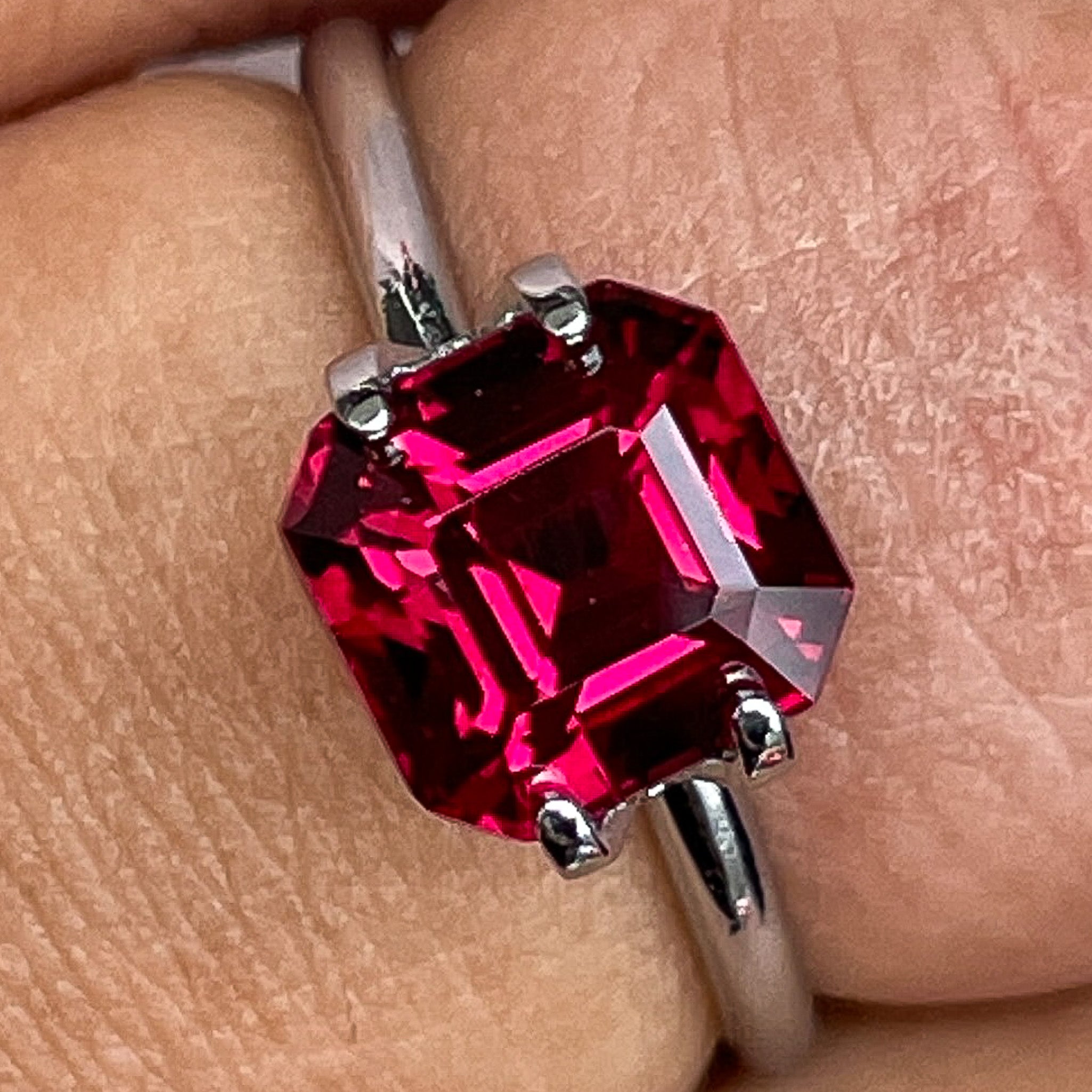 Natural Pyrope Almandite Garnet 3.38 Ct emerald cut gemstone from NASHGEMS, deep red VVS loose garnet for engagement rings.