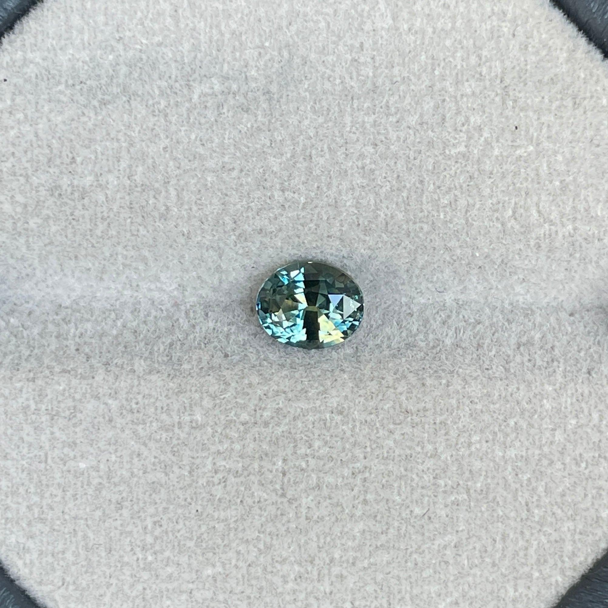 Parti sapphire stone Oval cut 1.27 crt bi colour sapphire. Clarkson uni, Loose Stone - NASHGEMS