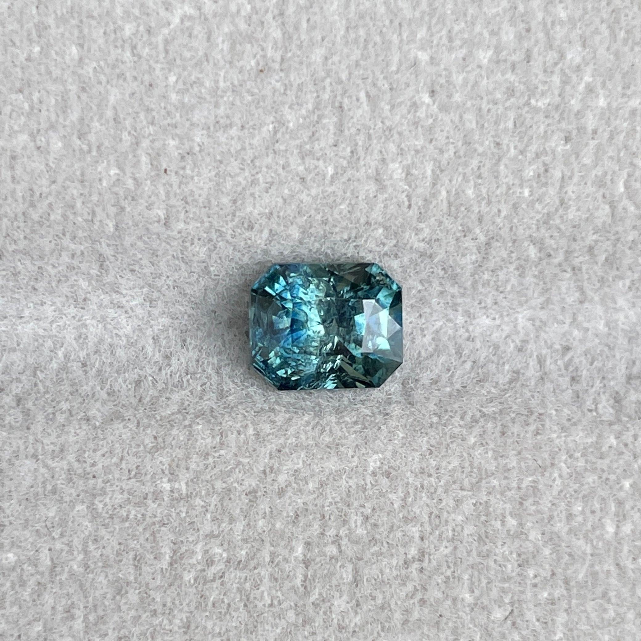 Natural Blue Green Sapphire Radiant Cut 5.40 x 6.50 Mm. 1.38 crt