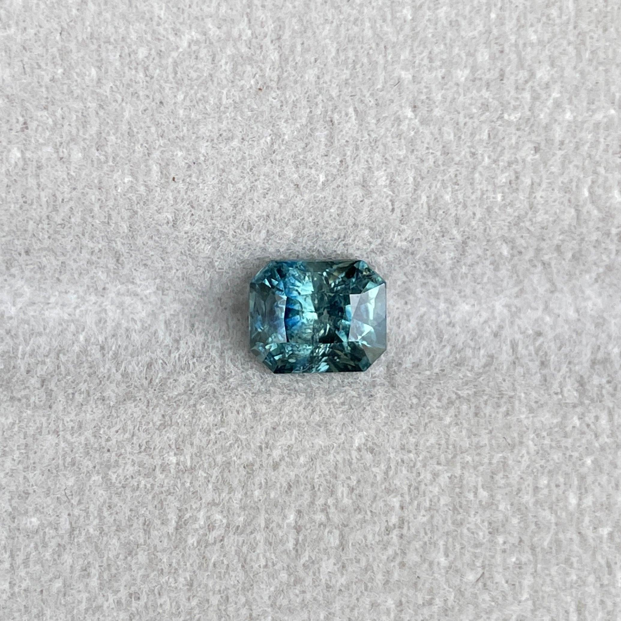 Natural Blue Green Sapphire Radiant Cut 5.40 x 6.50 Mm. 1.38 crt - NASHGEMS