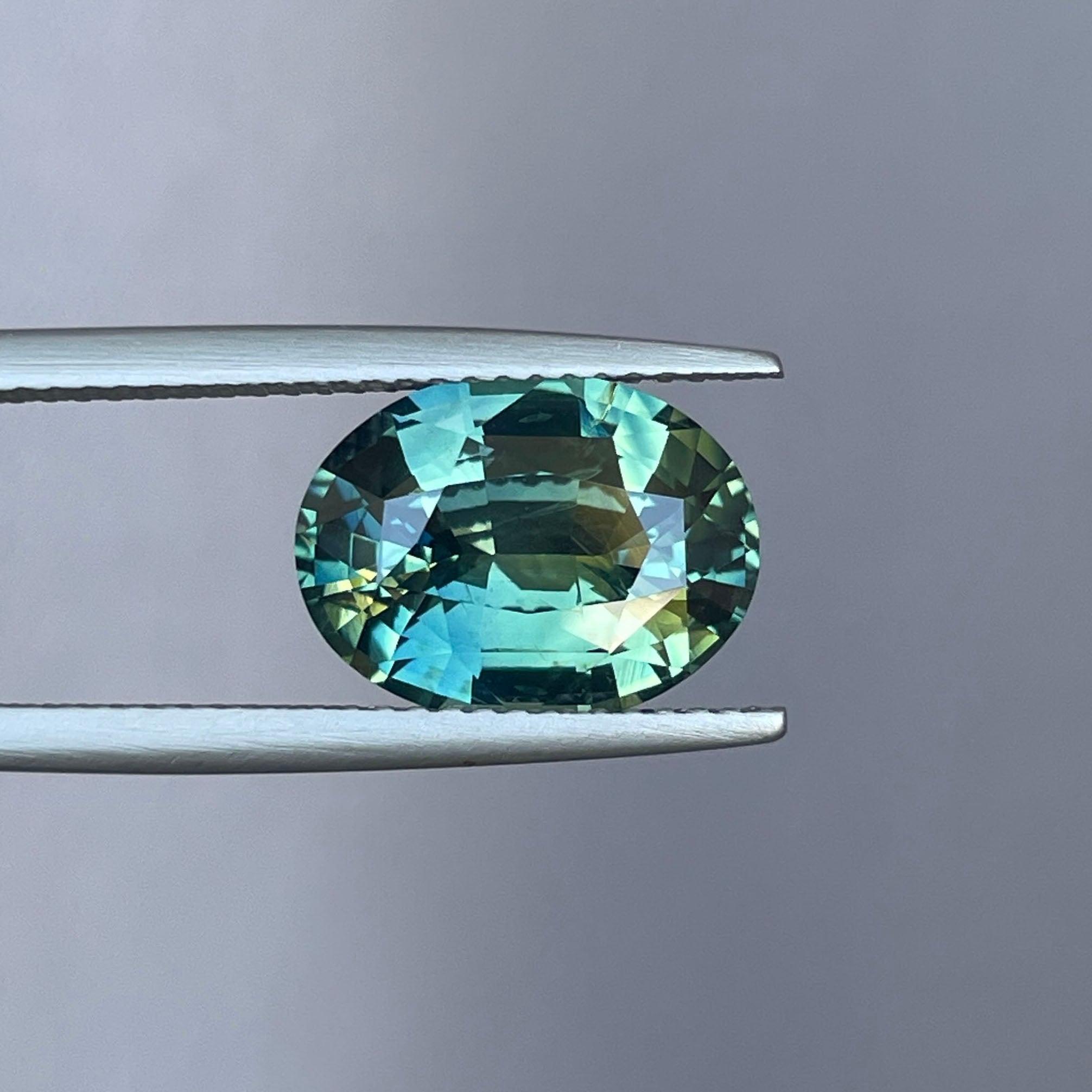 NATURAL PARTI SAPPHIRE TEAL OVAL 5.36