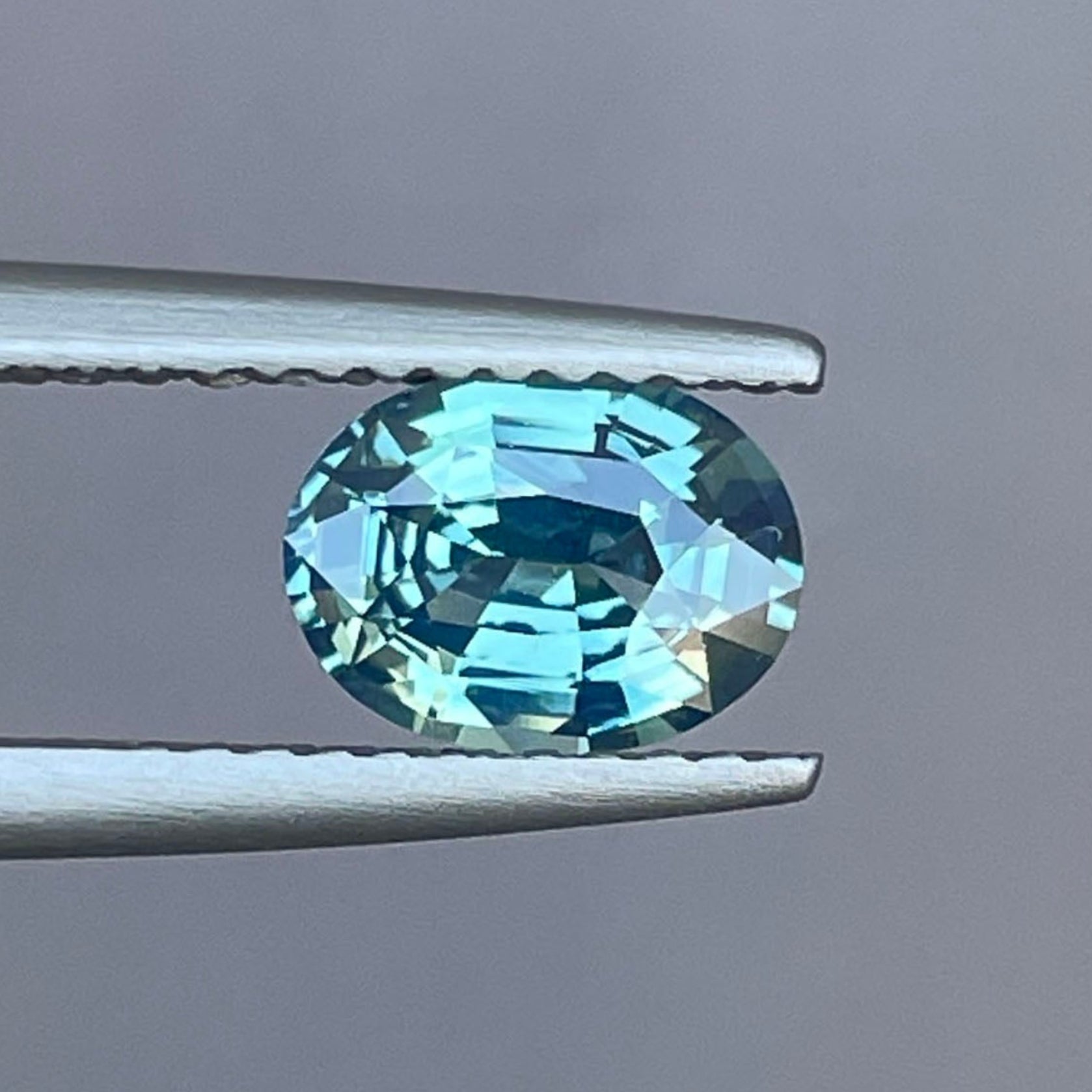Natural teal blue green sapphire oval cut 1.21 carats, heat-treated loose gemstone for rings or pendants.