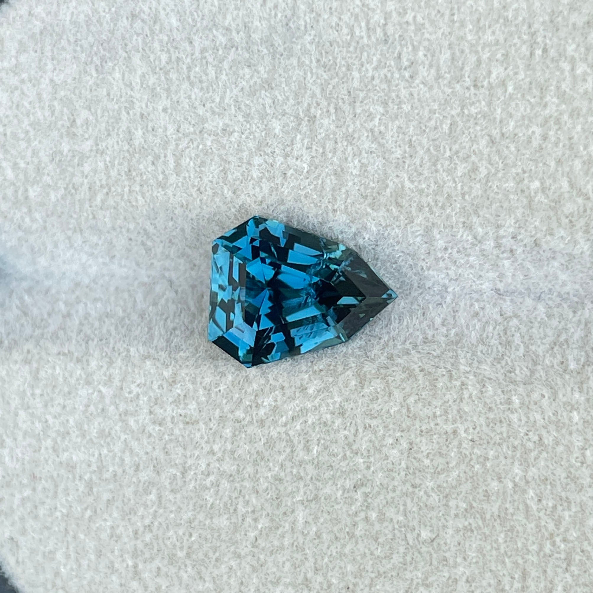 NATURAL TEAL SAPPHIRE SHEILD CUT 3.51