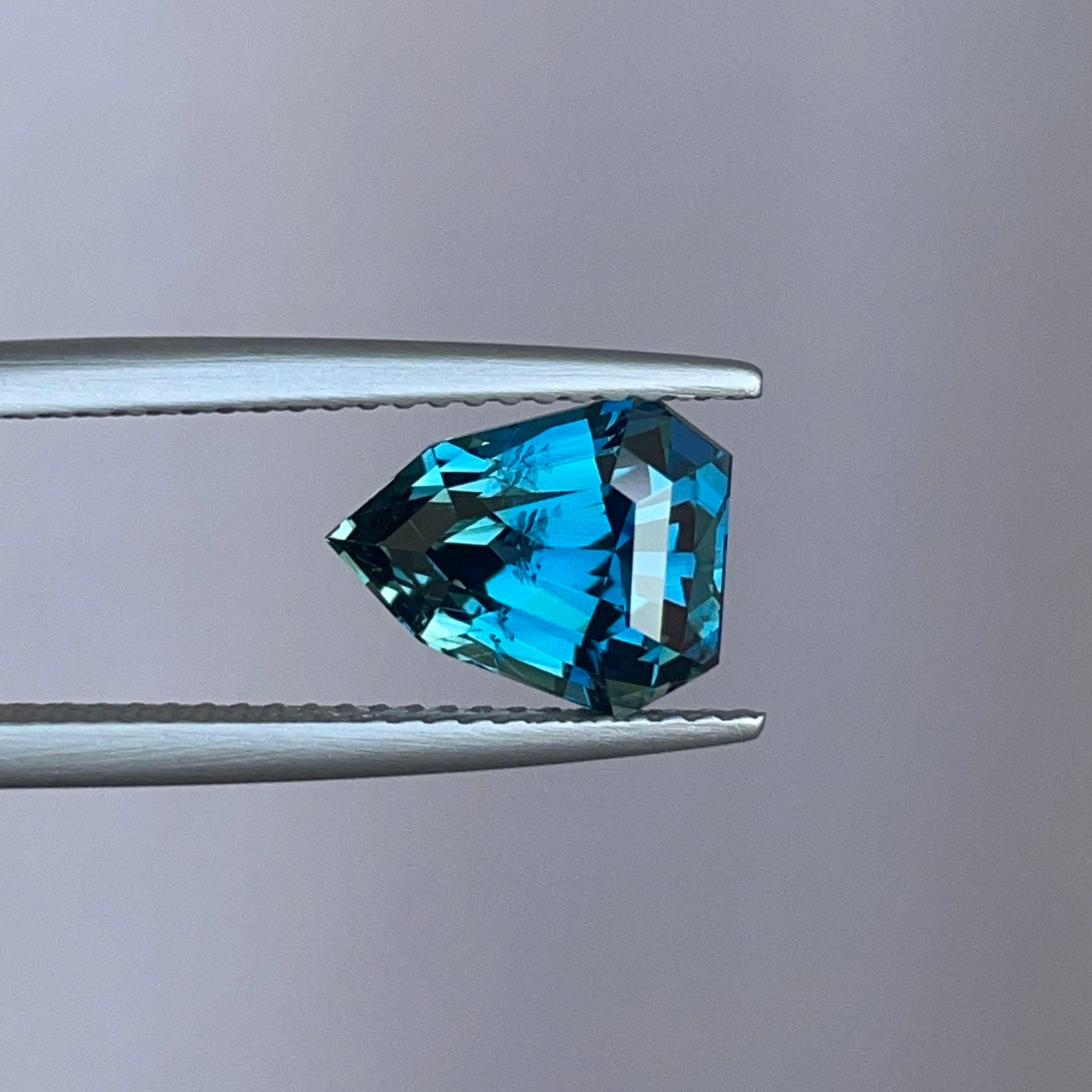 NATURAL TEAL SAPPHIRE SHEILD CUT 3.51