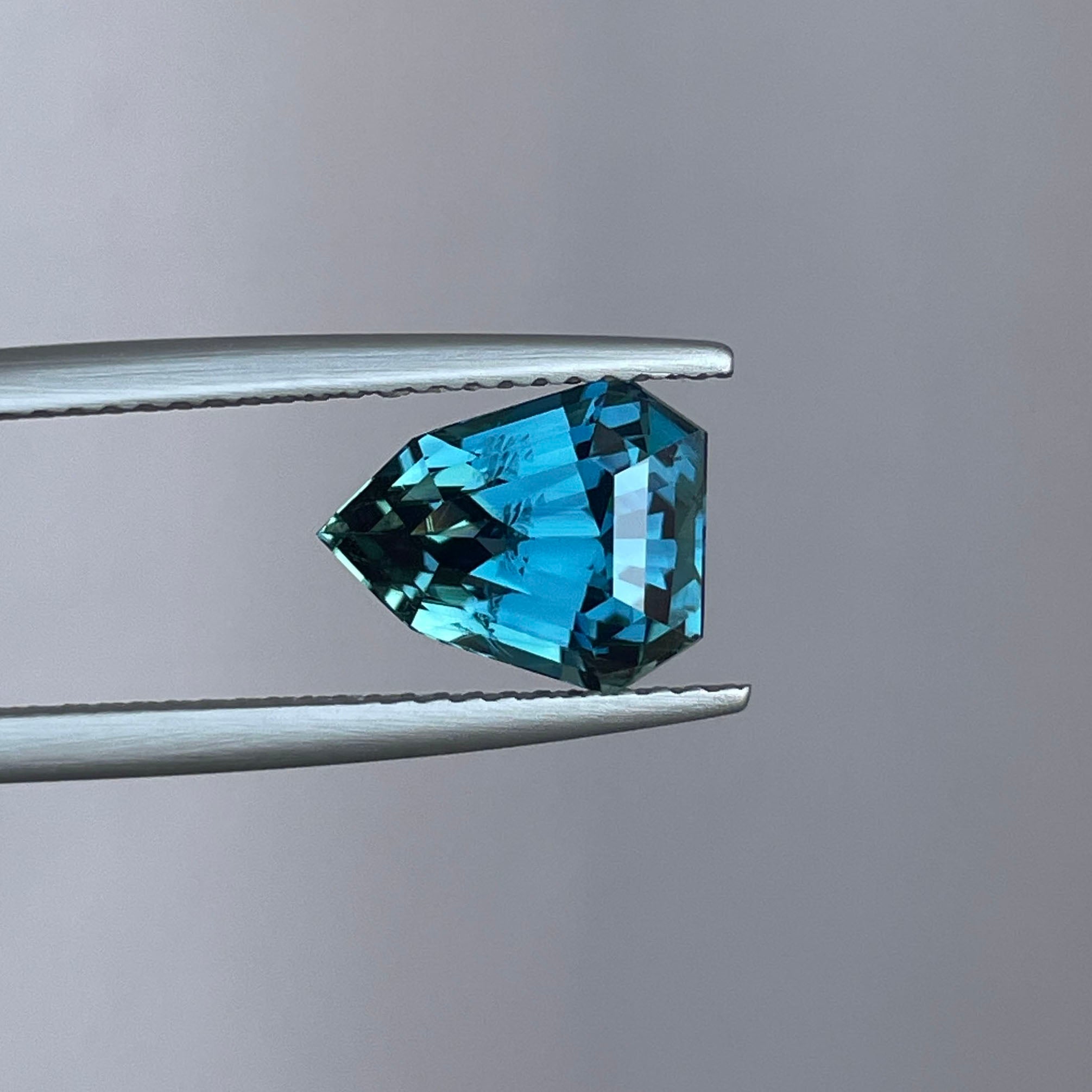 NATURAL TEAL SAPPHIRE SHEILD CUT 3.51