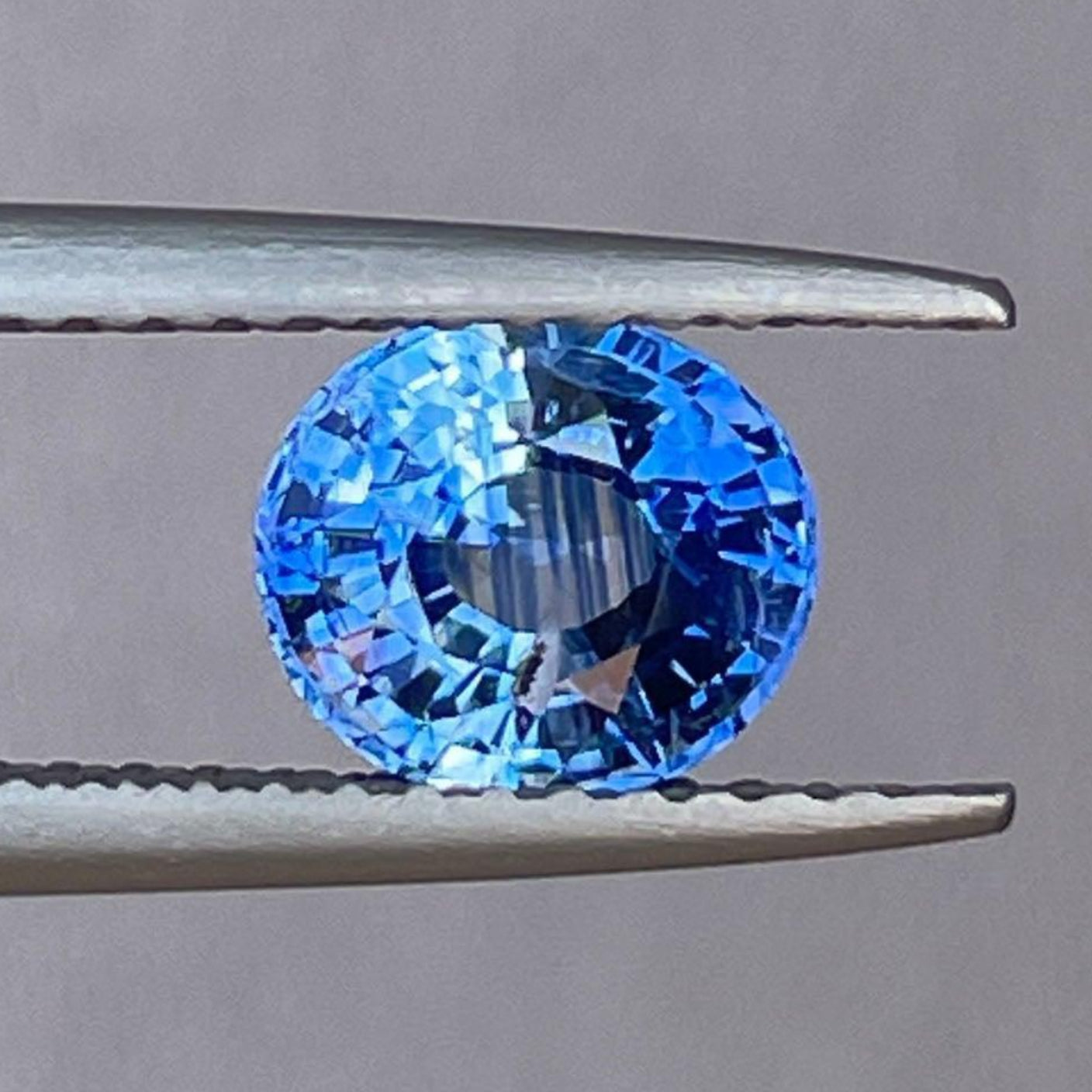 Natural blue sapphire Neelam birthstone gemstone, 1.27 ct, in a NASHGEMS blue sapphire ring for women, from Sri Lanka.
