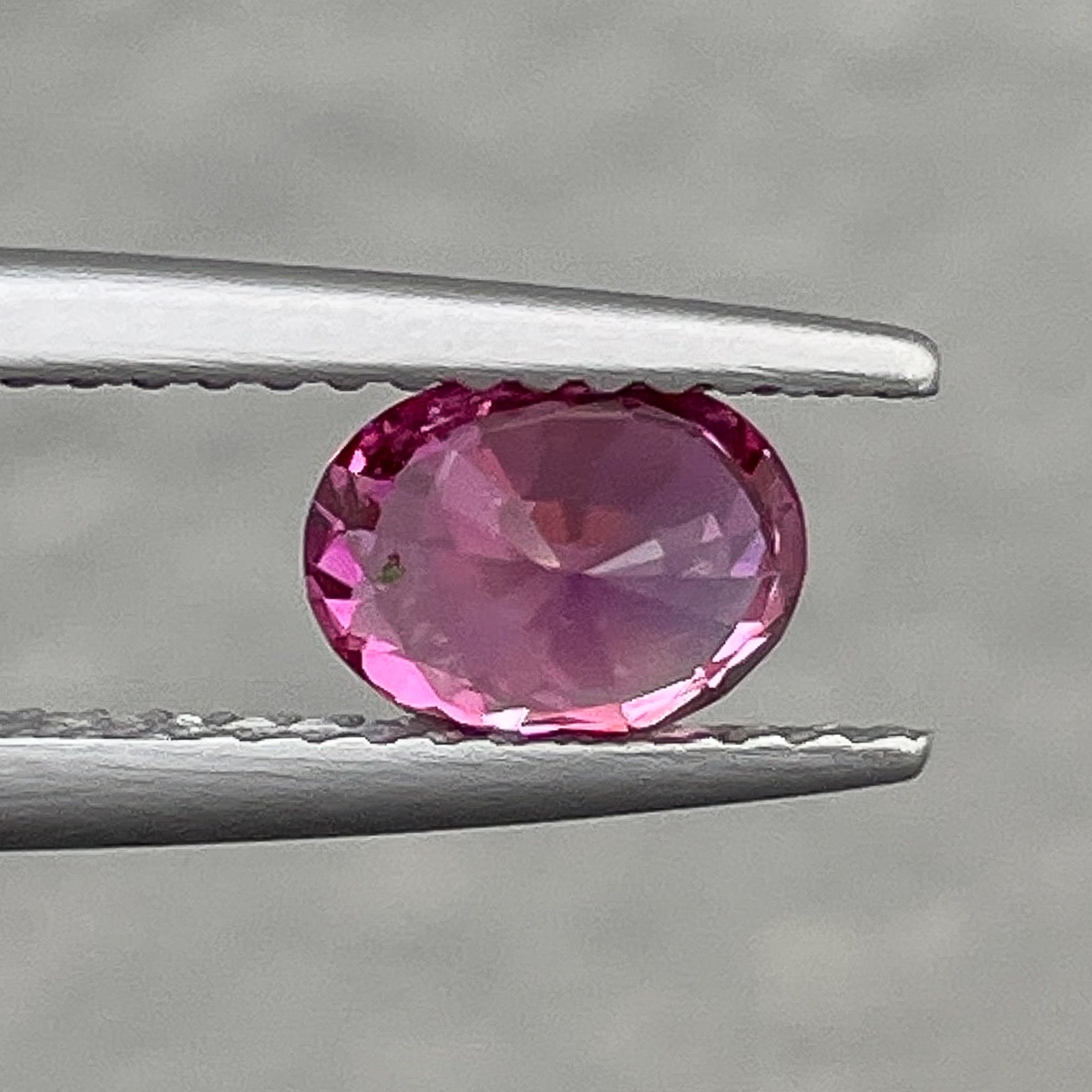 Natural pink sapphire loose gemstone, 1.00 carat oval cut, heat treated, from NASHGEMS, ideal for engagement rings.