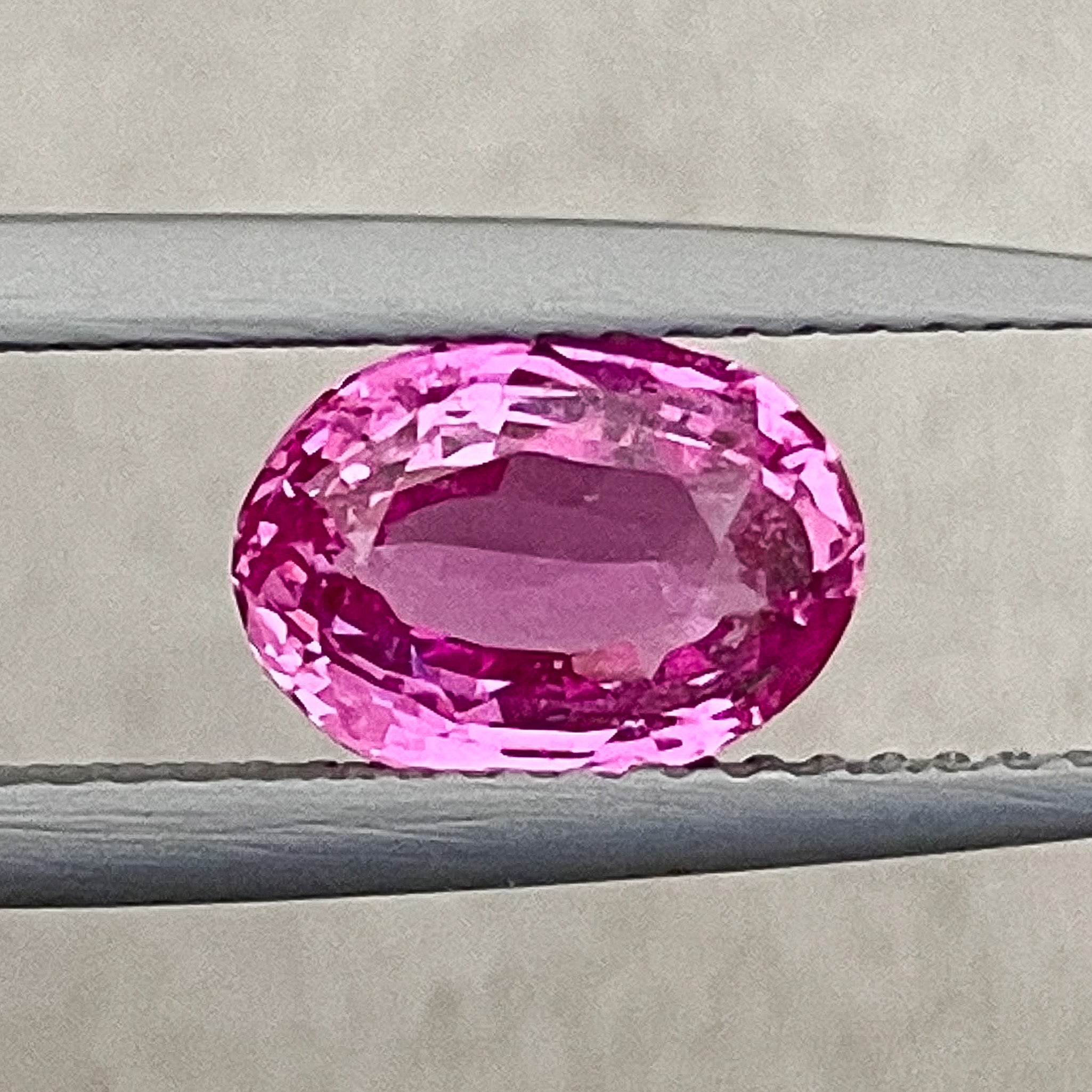 Natural pink sapphire loose gemstone, 2.05 carats, oval cut, heated pink sapphire by NASHGEMS for engagement jewelry.