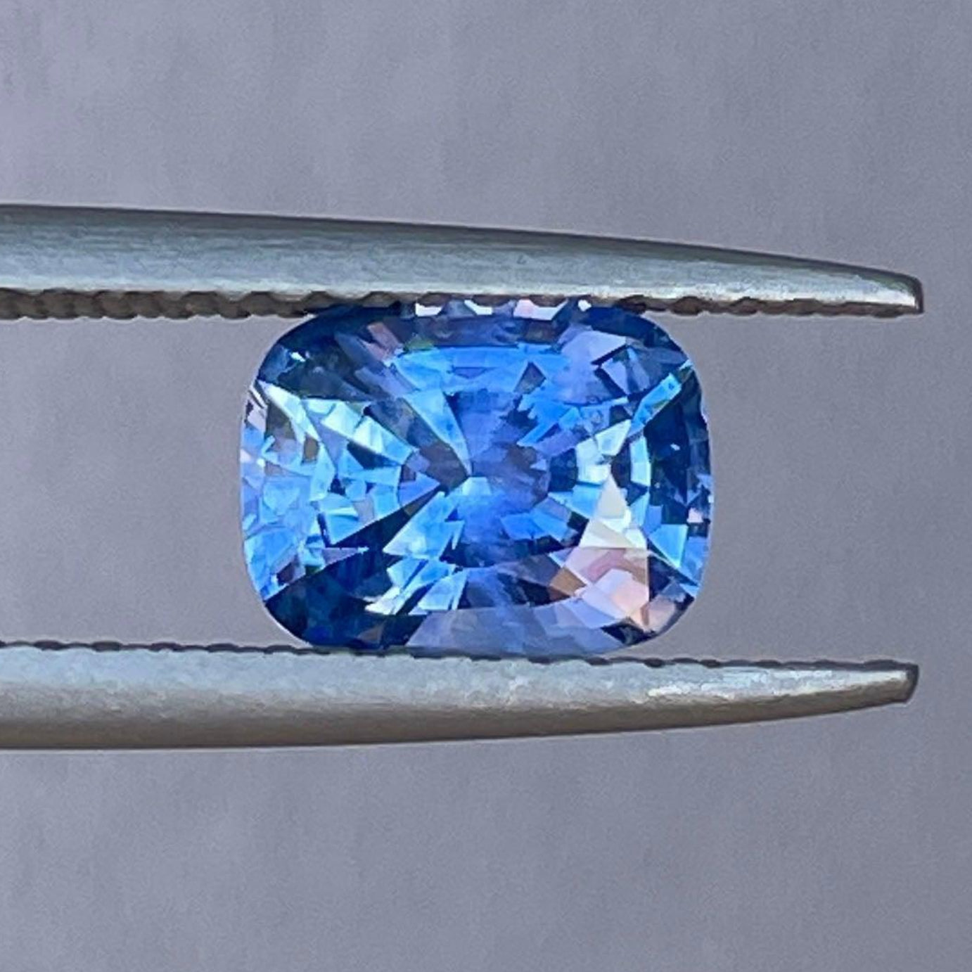 Blue sapphire loose gemstone, 1.31 ct., from NASHGEMS, showcasing a vibrant, high-quality precious stone for engagement rings.