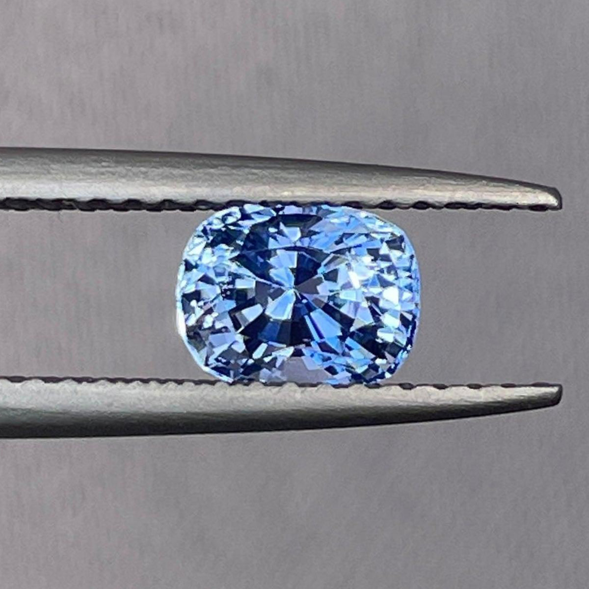 Light blue sapphire gemstone from NASHGEMS, 1.06 carats, Sri Lankan Ceylon blue sapphire for women's birthstone jewelry.