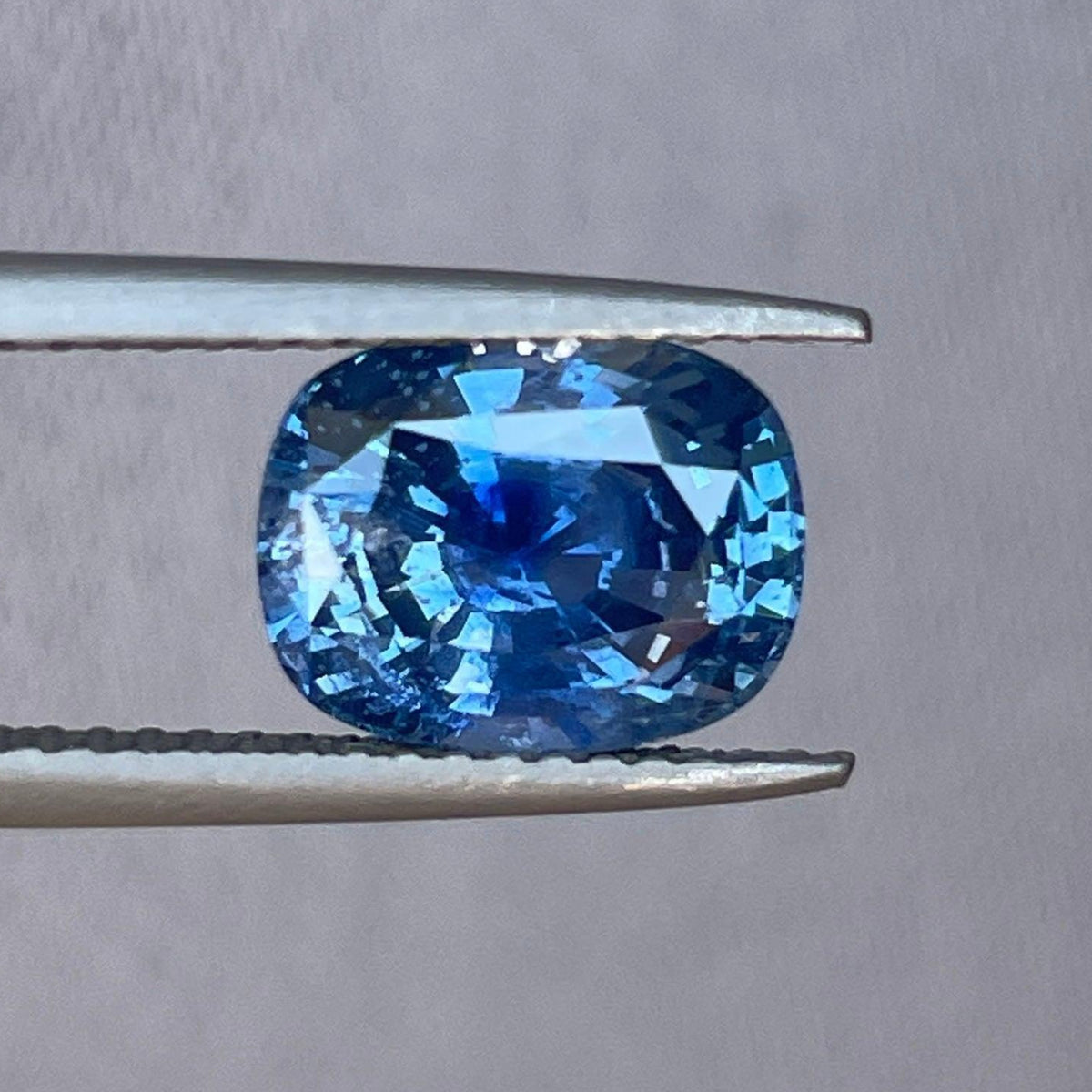 Natural earth-mined blue sapphire gemstone, 3.16 carats, showcasing deep blue color and clarity, ideal for jewelry from NASHGEMS.