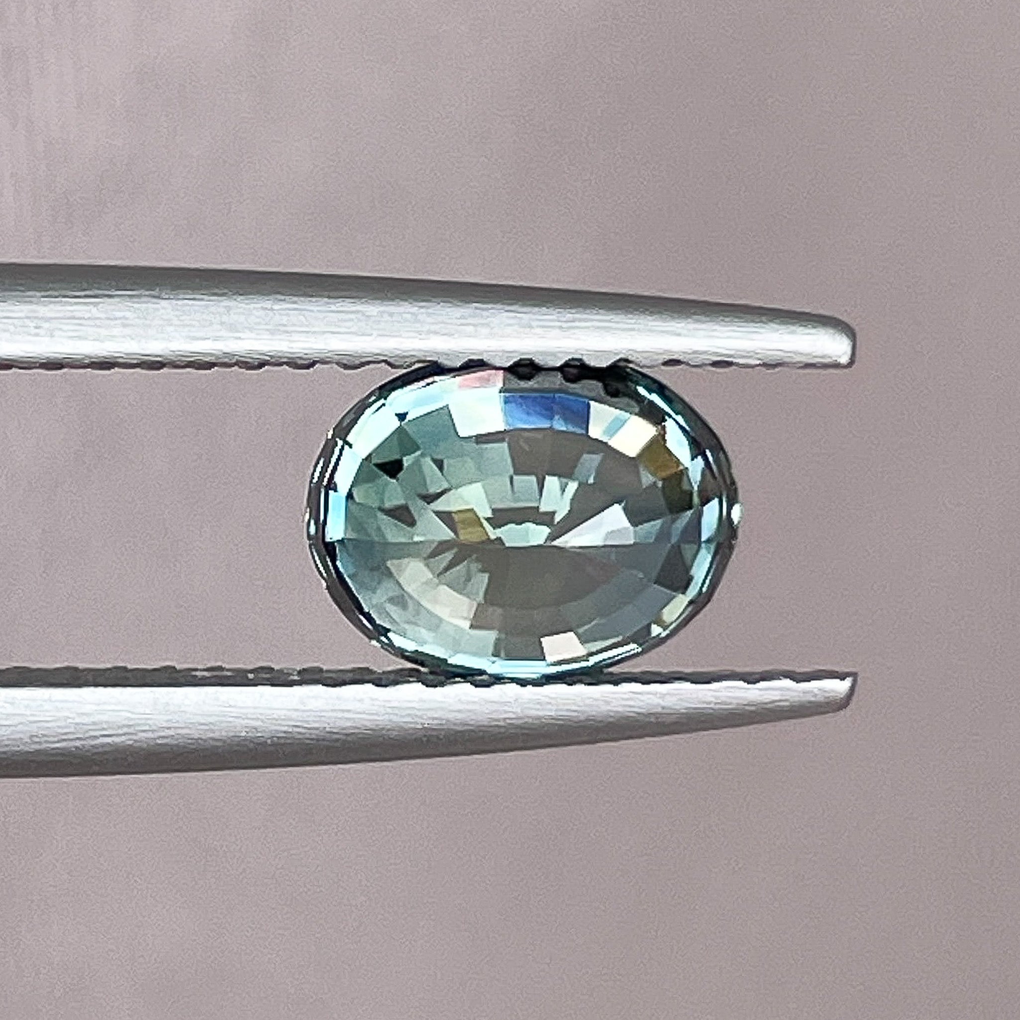 Natural teal blue-green sapphire, 2.03 carat oval cut loose gemstone by NASHGEMS, ideal for engagement rings or custom jewelry.
