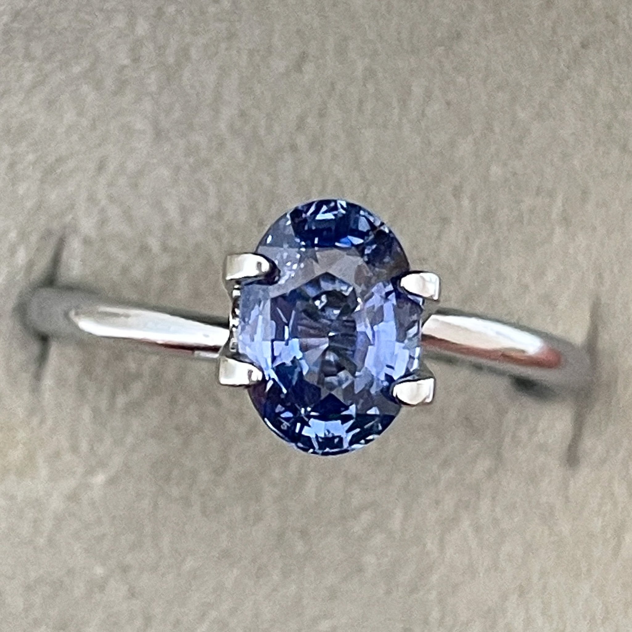 Natural Ceylon blue sapphire loose gemstone, 1.54 carats, oval cut, from NASHGEMS, ideal for engagement rings or jewelry making.