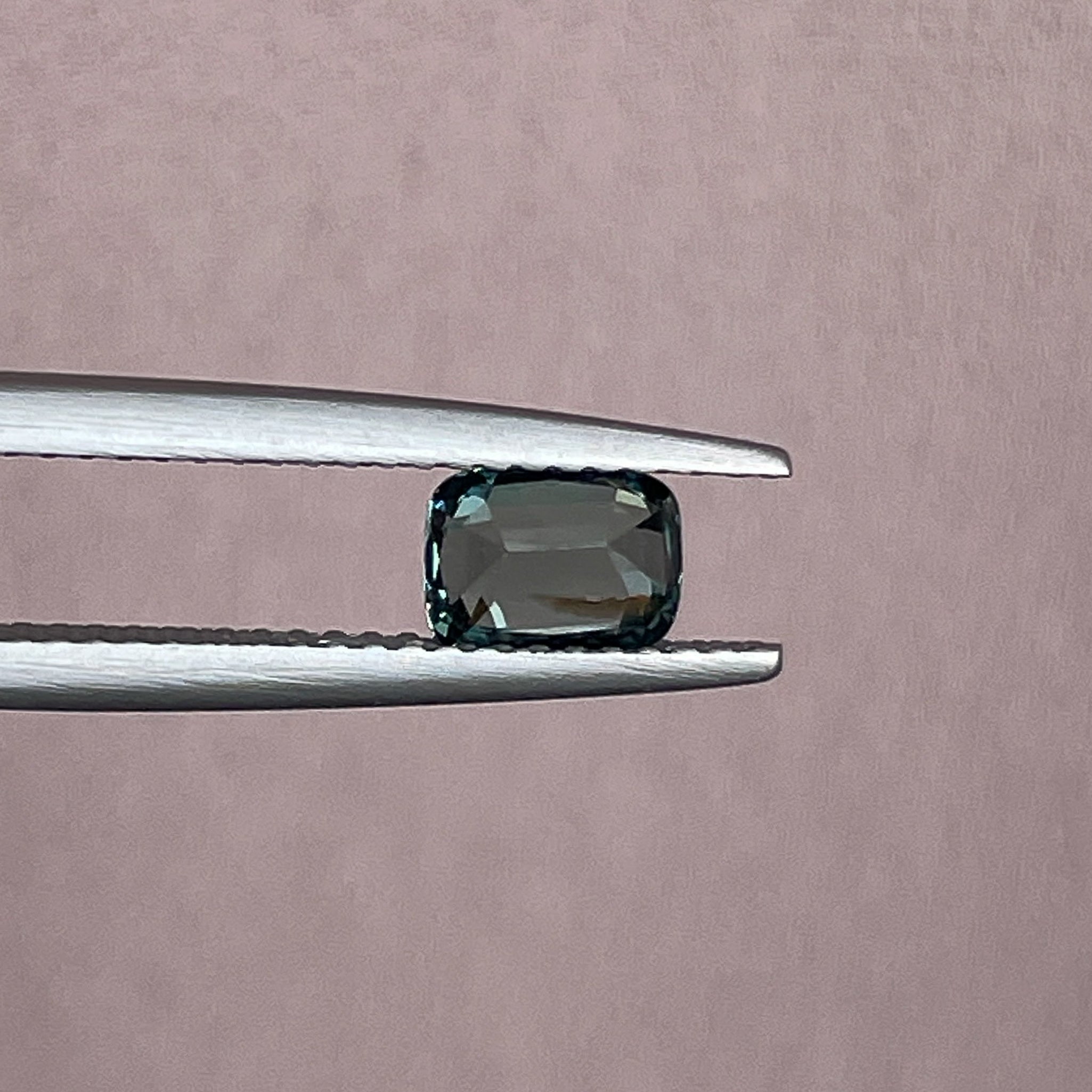 Natural teal green sapphire 1.03 Ct cushion cut loose gemstone by NASHGEMS, ideal for engagement rings or custom jewelry.