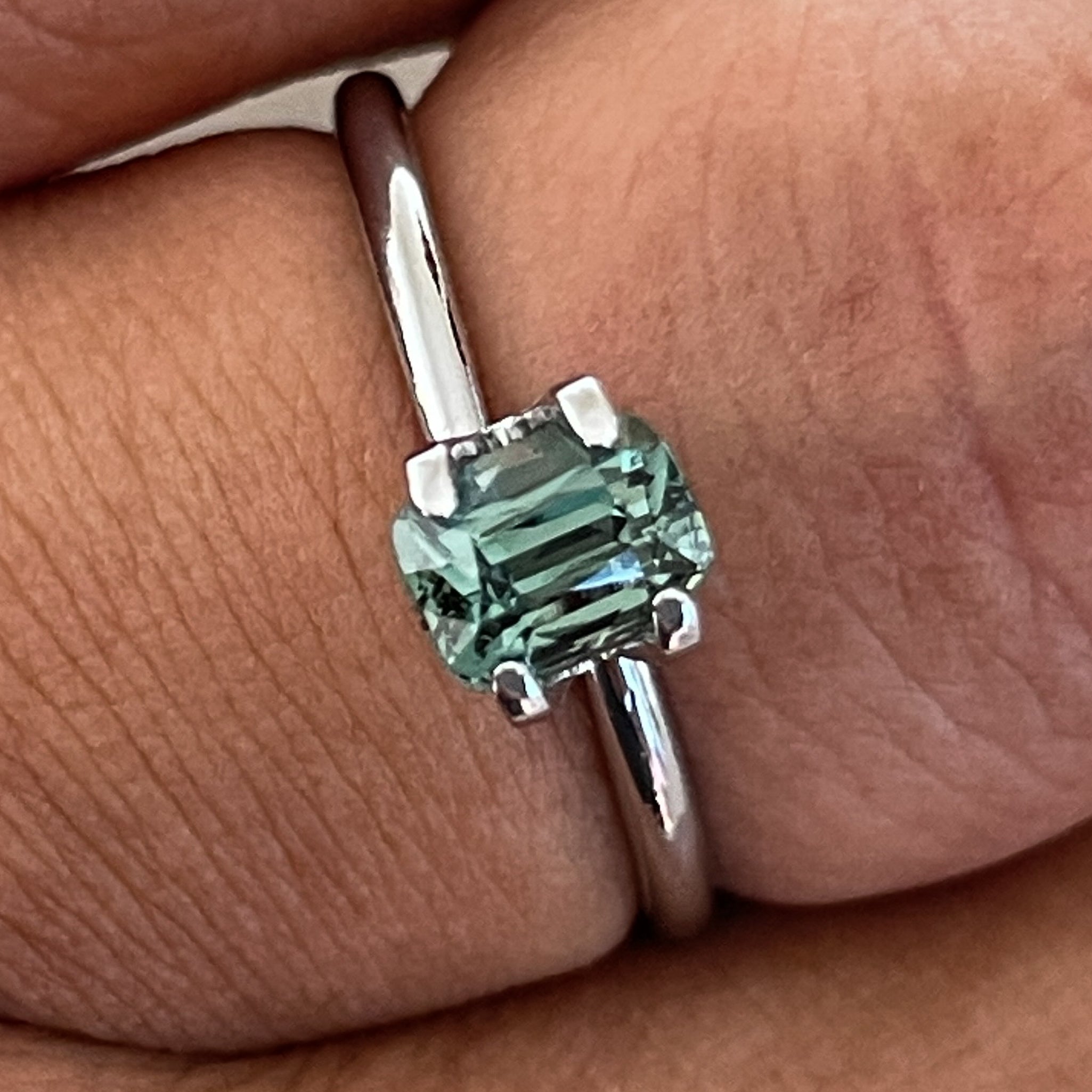 Natural teal green sapphire 1.03 Ct cushion cut loose gemstone from NASHGEMS, ideal for engagement rings or custom jewelry.