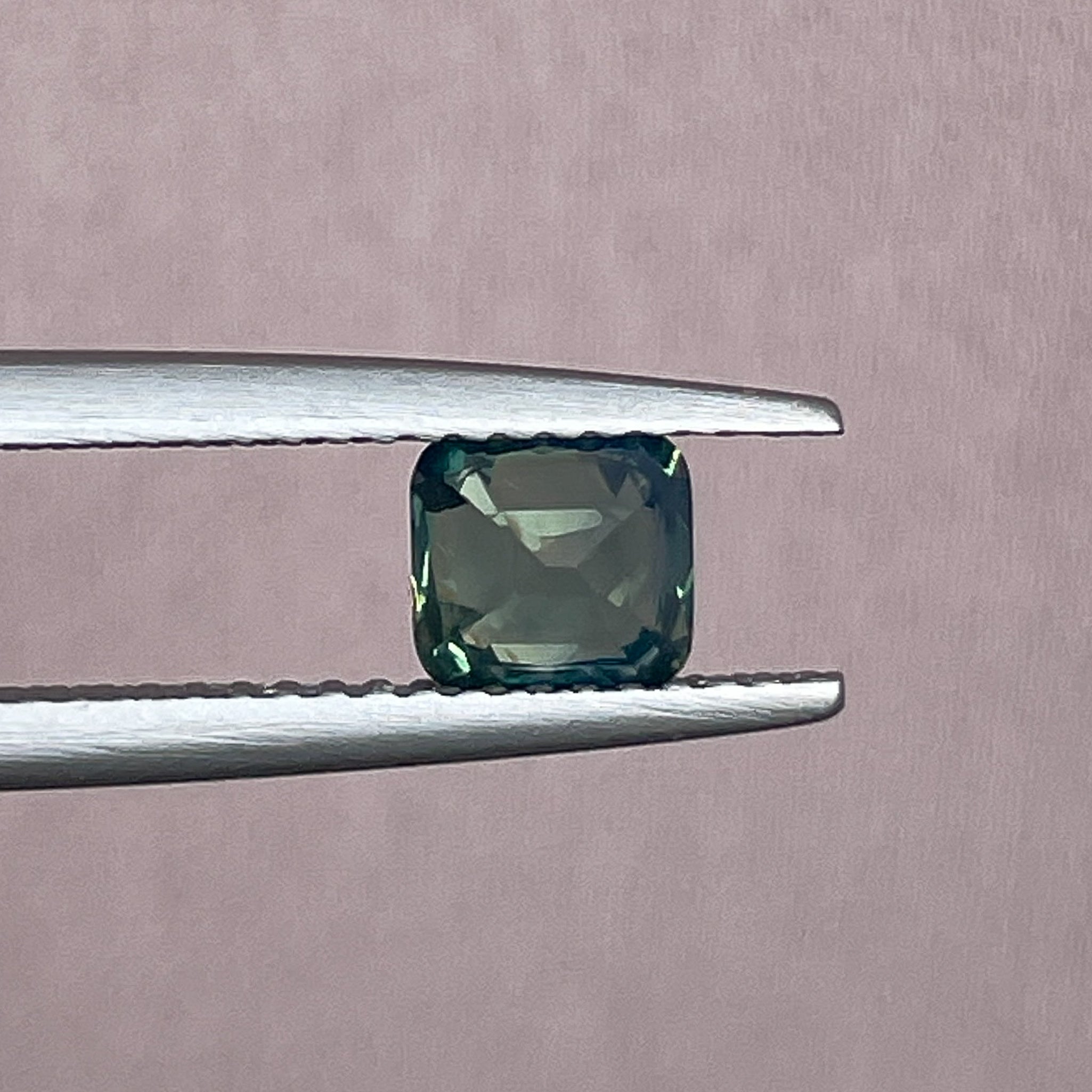Natural pale green sapphire, 1.06 ct cushion cut teal loose gemstone from NASHGEMS, ideal for engagement rings or custom jewelry.