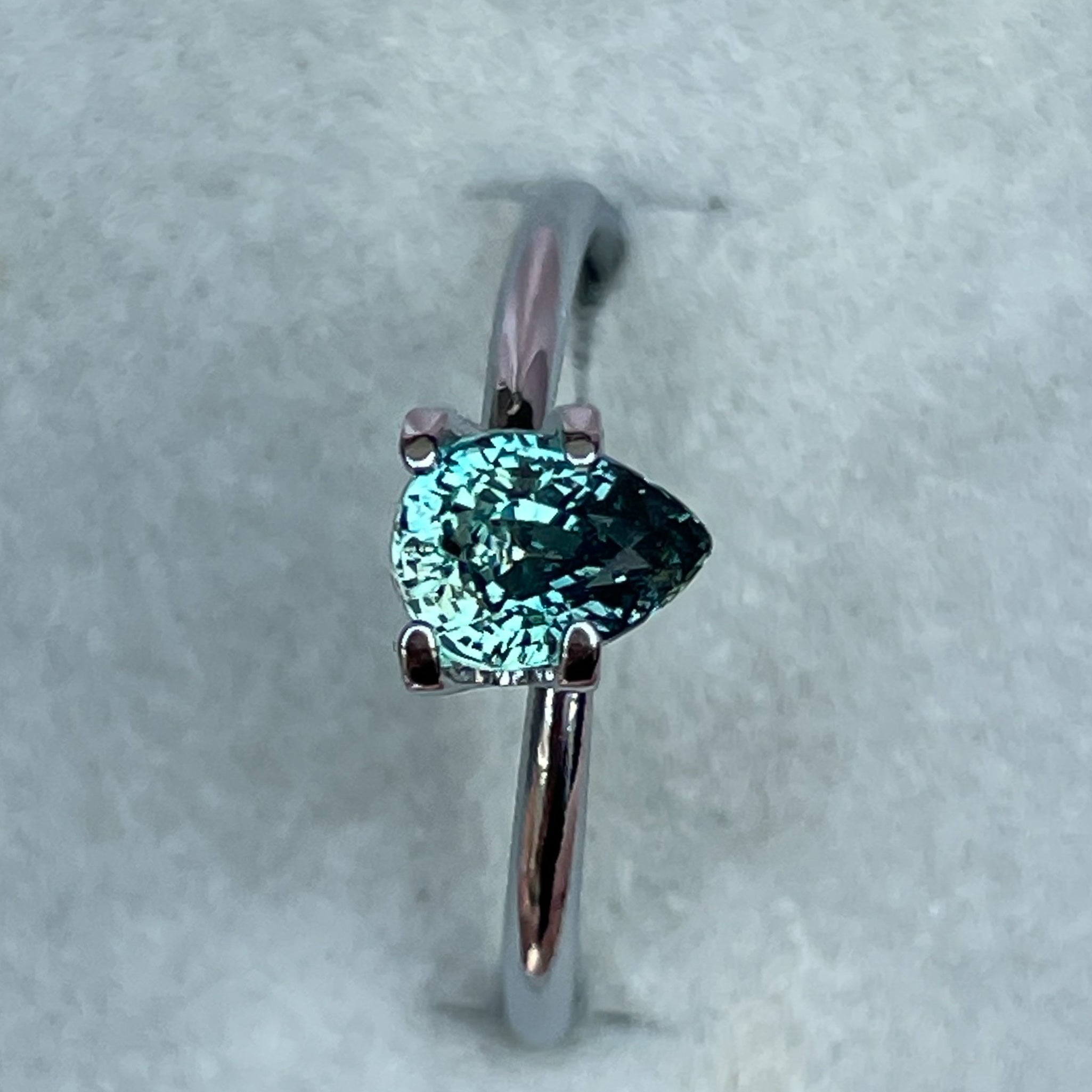 Natural teal sapphire loose gemstone, 1.09 ct pear shape, heated teal sapphire for jewelry or pendant creation.