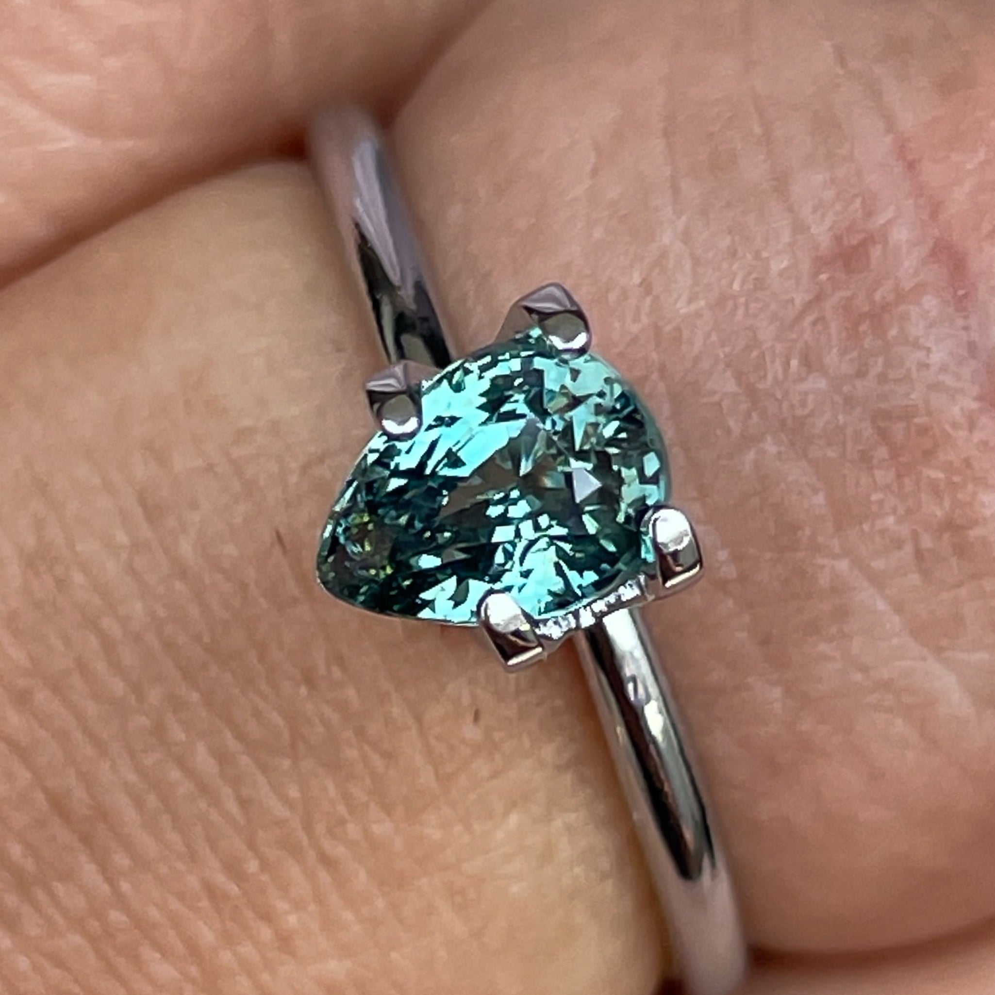 Natural teal sapphire loose gemstone, 1.09 Ct pear shape, heated sapphire for jewelry by NASHGEMS, suitable for pendants or custom designs.