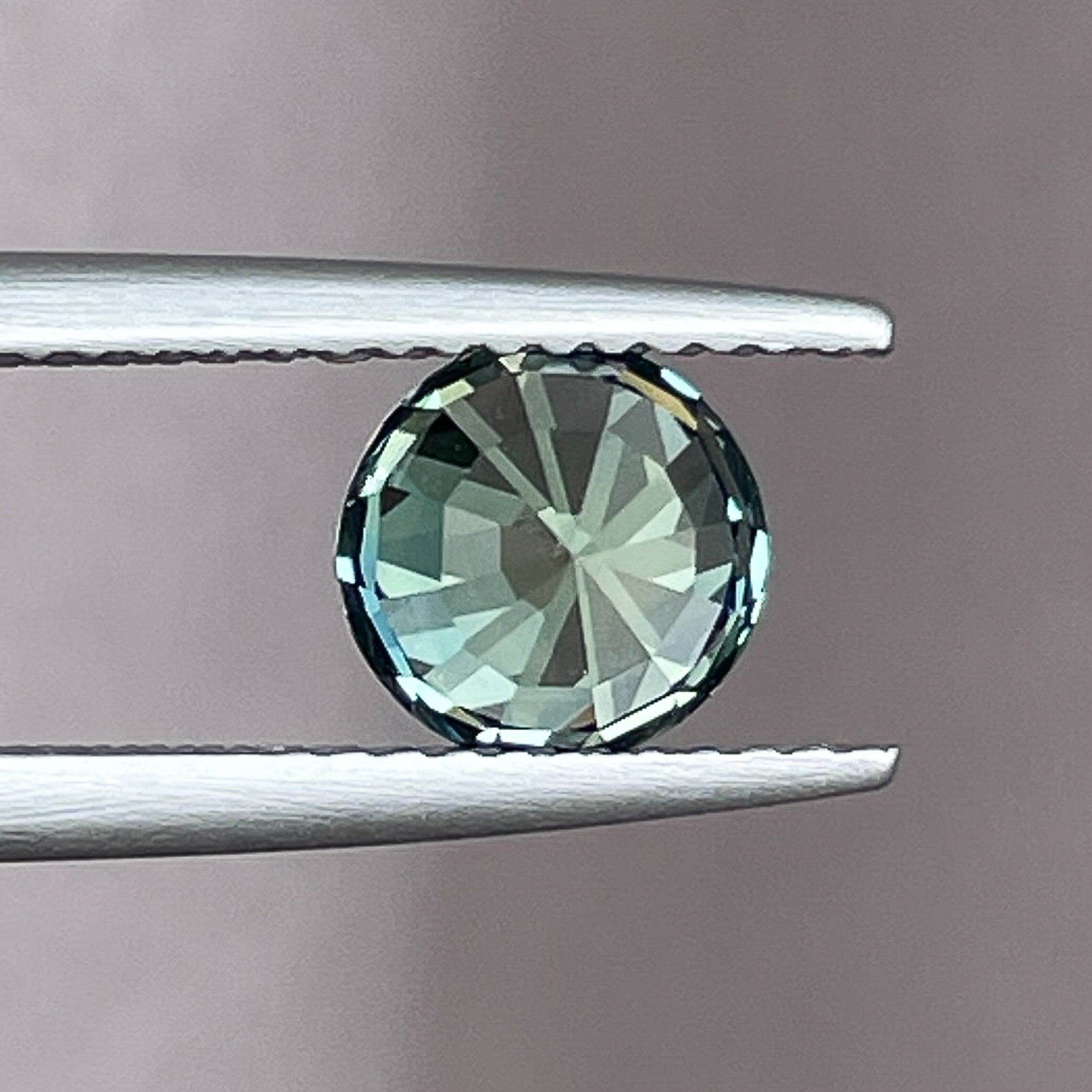Natural pale green teal sapphire, 1.90 Ct round cut loose gemstone by NASHGEMS, ideal for engagement rings or custom jewelry.