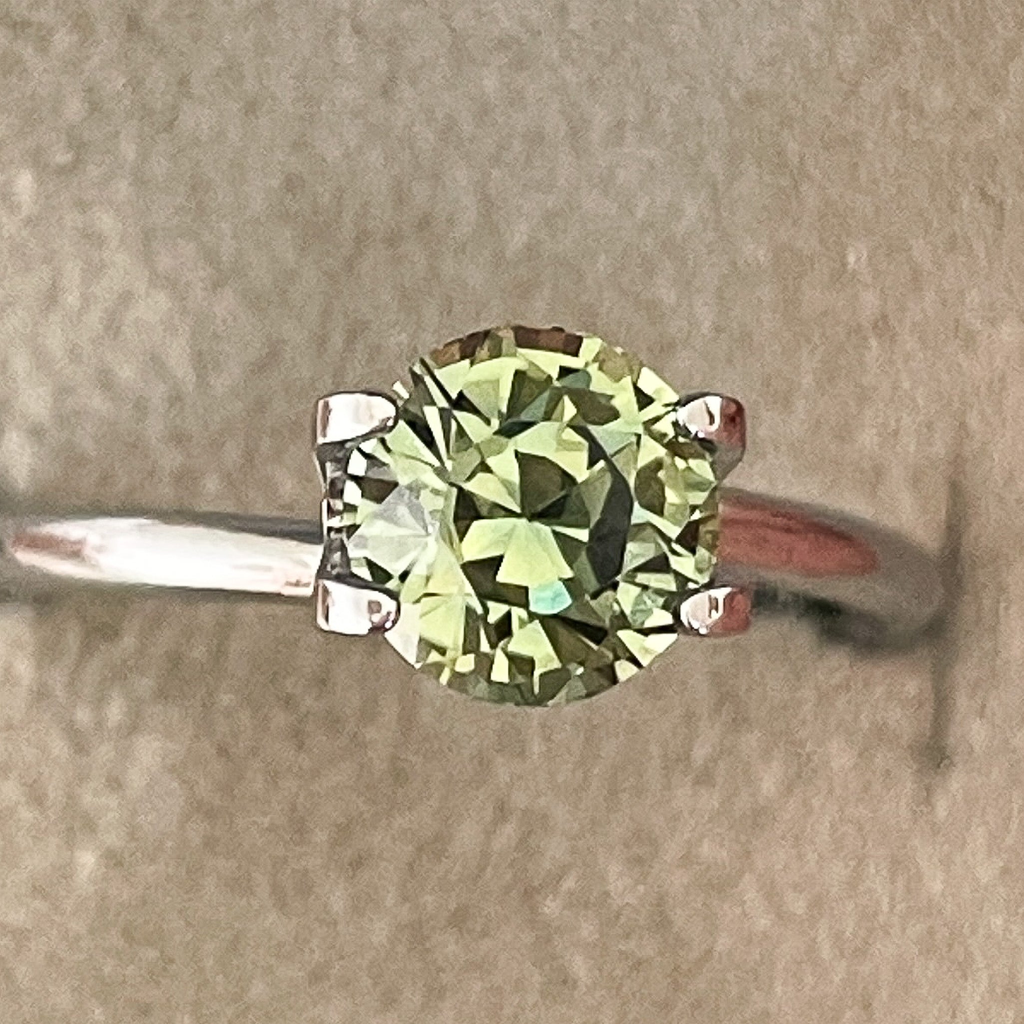Natural pale green sapphire, 1.90 ct round cut teal loose gemstone from NASHGEMS, ideal for engagement rings or custom jewelry.
