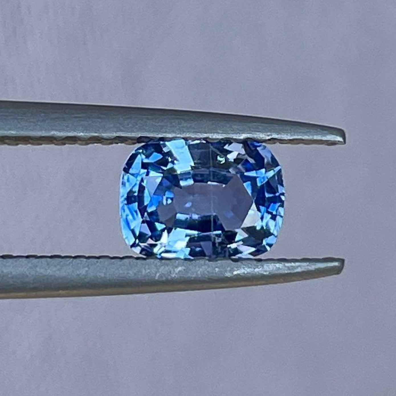 Light blue Ceylon sapphire gemstone from NASHGEMS, 0.74 carats, set in elegant women's birthstone jewelry, perfect for engagement rings.