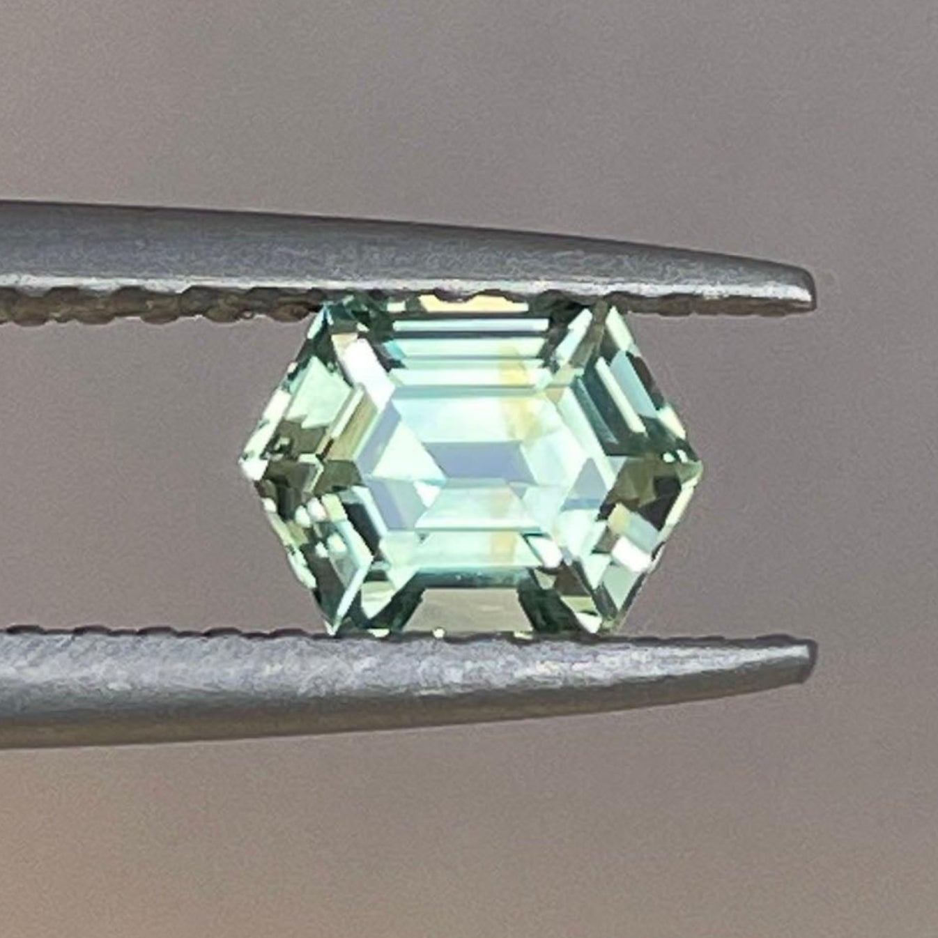 Light green sapphire gemstone pendant with 0.77 ct teal sapphire, ideal for jewelry making and ring or necklace setting.