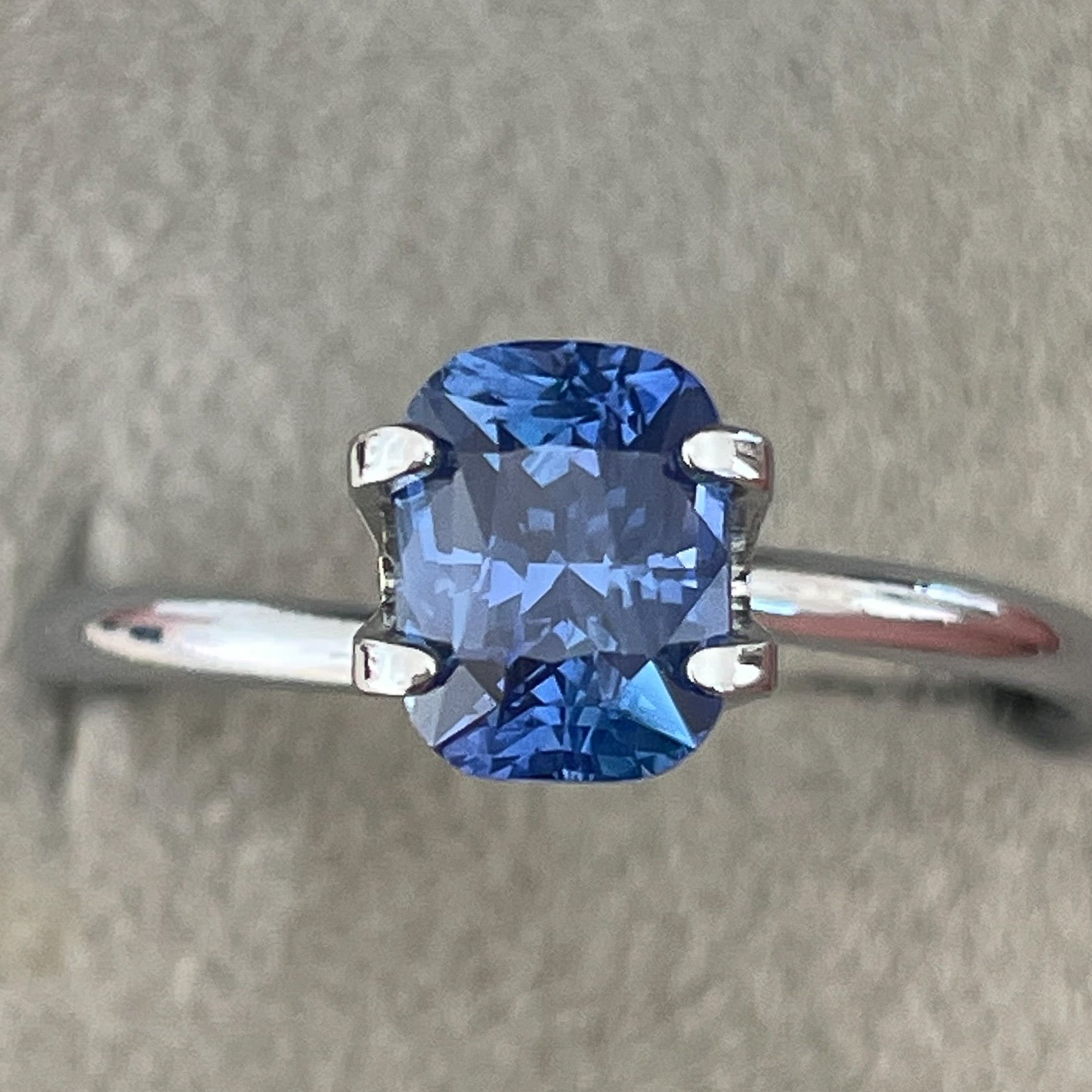 Natural Ceylon Blue Sapphire 1.60 Ct cushion cut, vivid blue loose gemstone from NASHGEMS for engagement or custom jewelry.