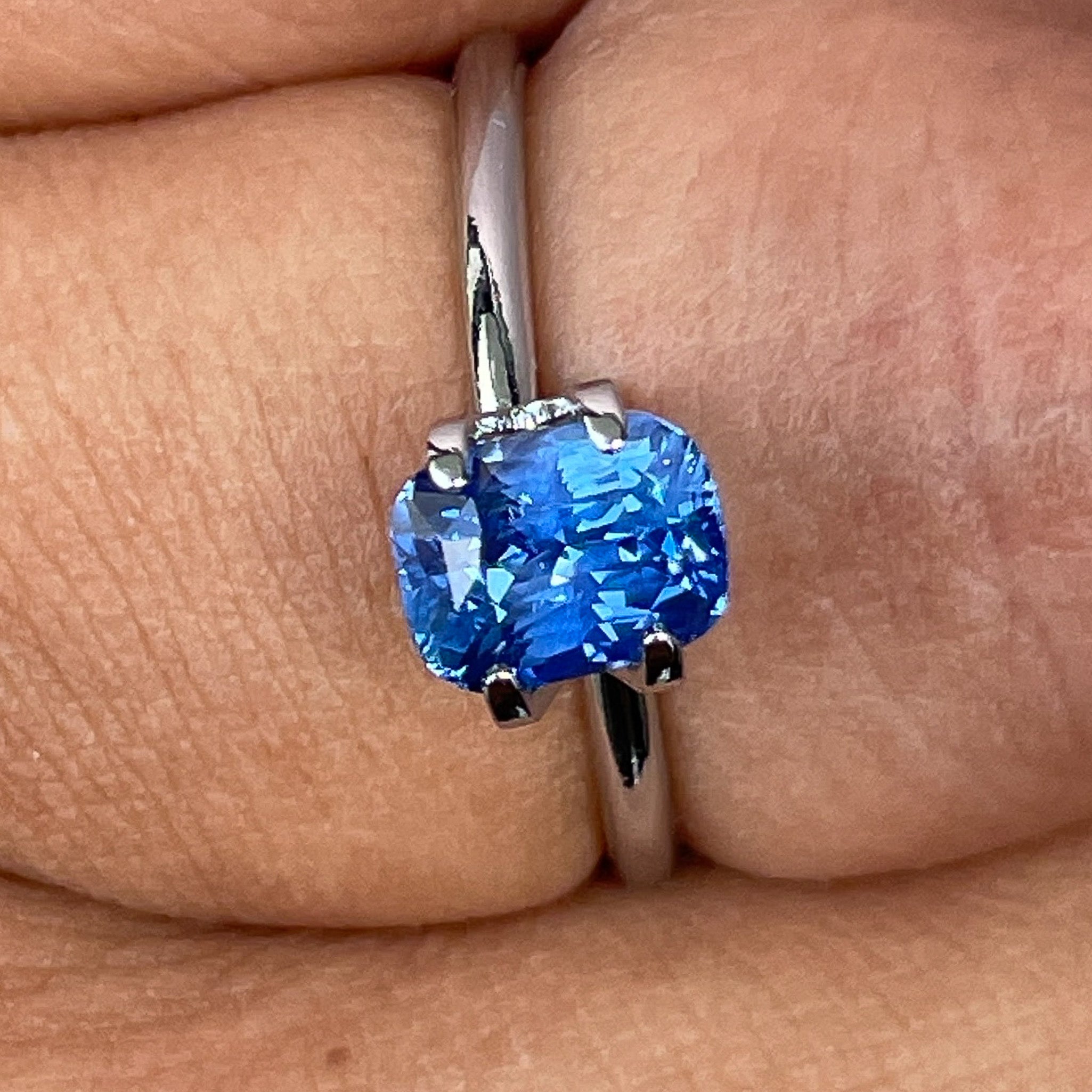 Natural Ceylon Blue Sapphire 1.60 Ct cushion cut loose gemstone by NASHGEMS, vivid blue, ideal for engagement rings or custom jewelry.