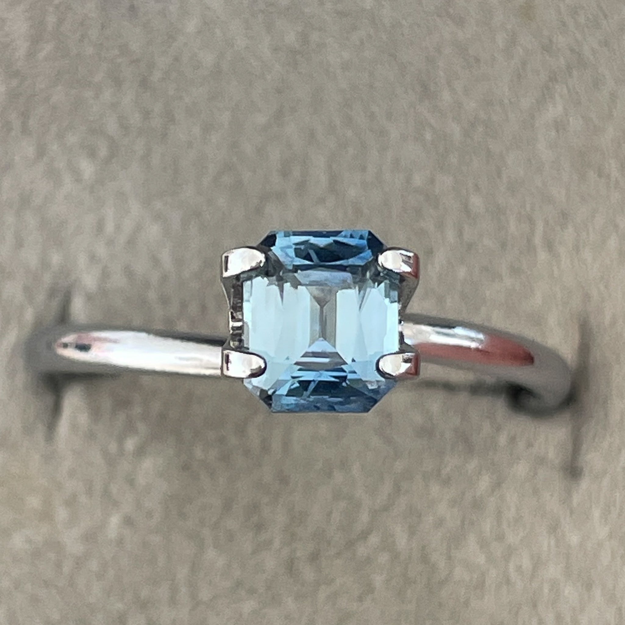 Natural pale blue sapphire, 1.08 Ct teal emerald cut loose gemstone by NASHGEMS, ideal for engagement rings and custom jewelry.