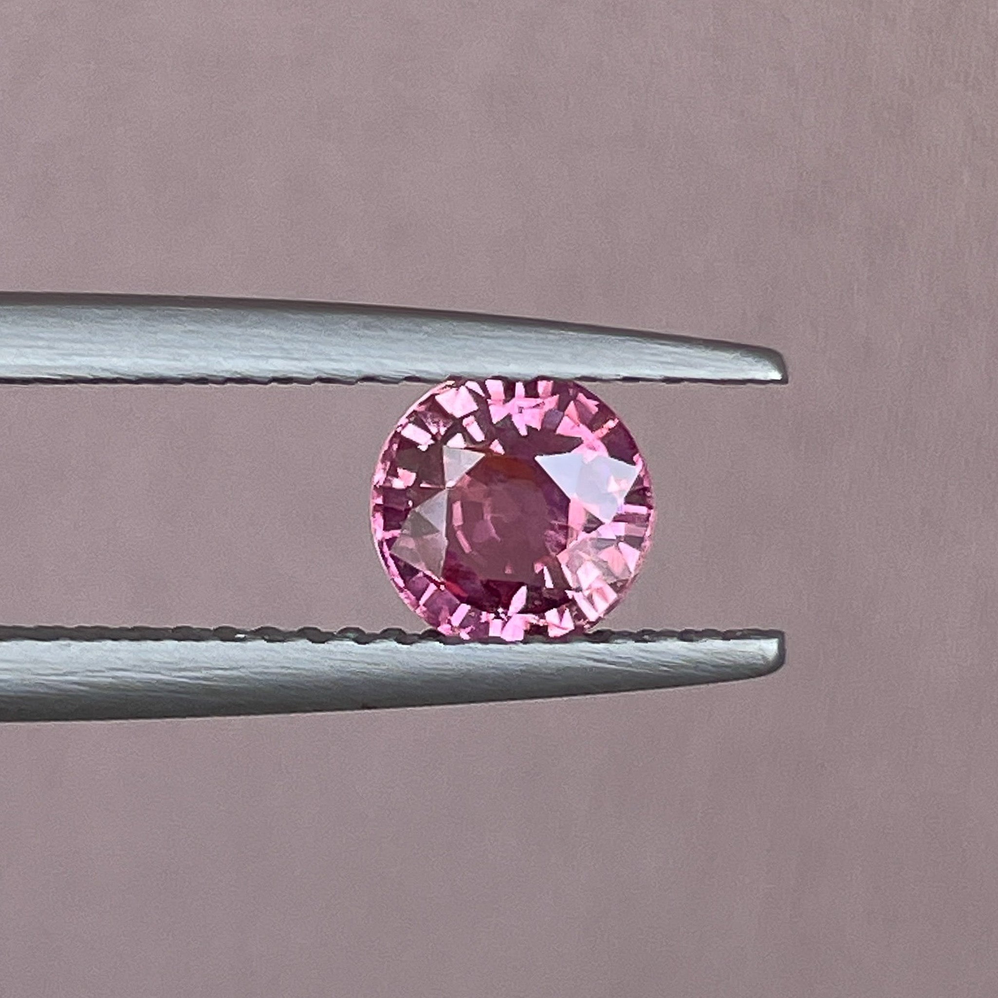 Natural pink sapphire 0.91 ct round cut by NASHGEMS, VVS clarity, no heat, perfect for engagement rings.