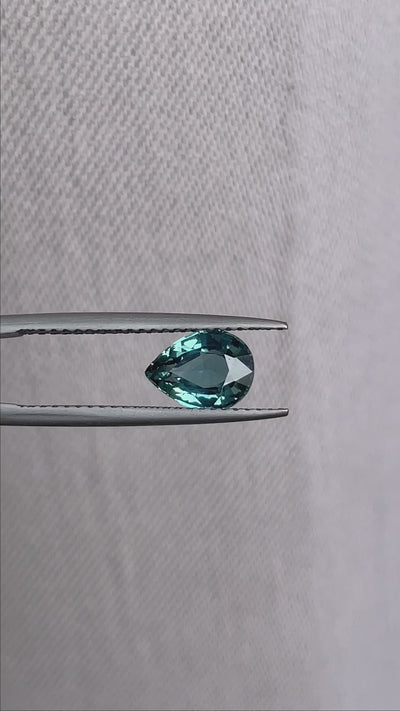 teal blue green parti sapphire pear drop cut gem 